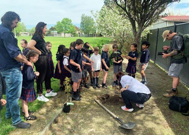 St Mary’s School pupils plant trees at the school as a part of the competition win. PHOTO:...