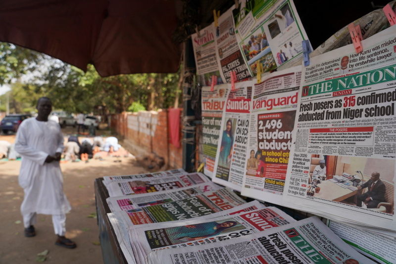 Newsstands in Nigeria report the kidnapping. Photo: Reuters