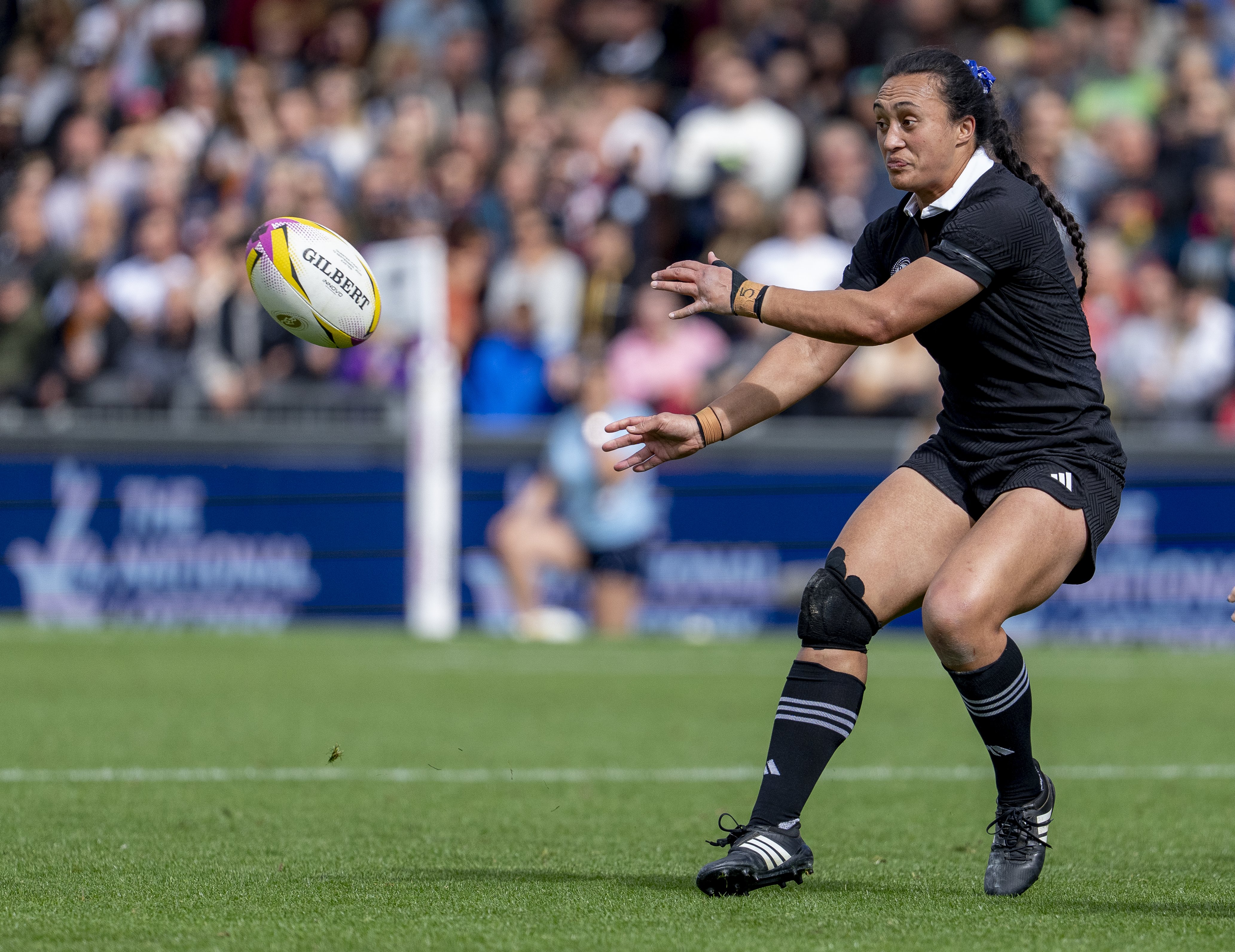Black Ferns first five Ruahei Demant sends away a pass during the Rugby World Cup quarterfinal...