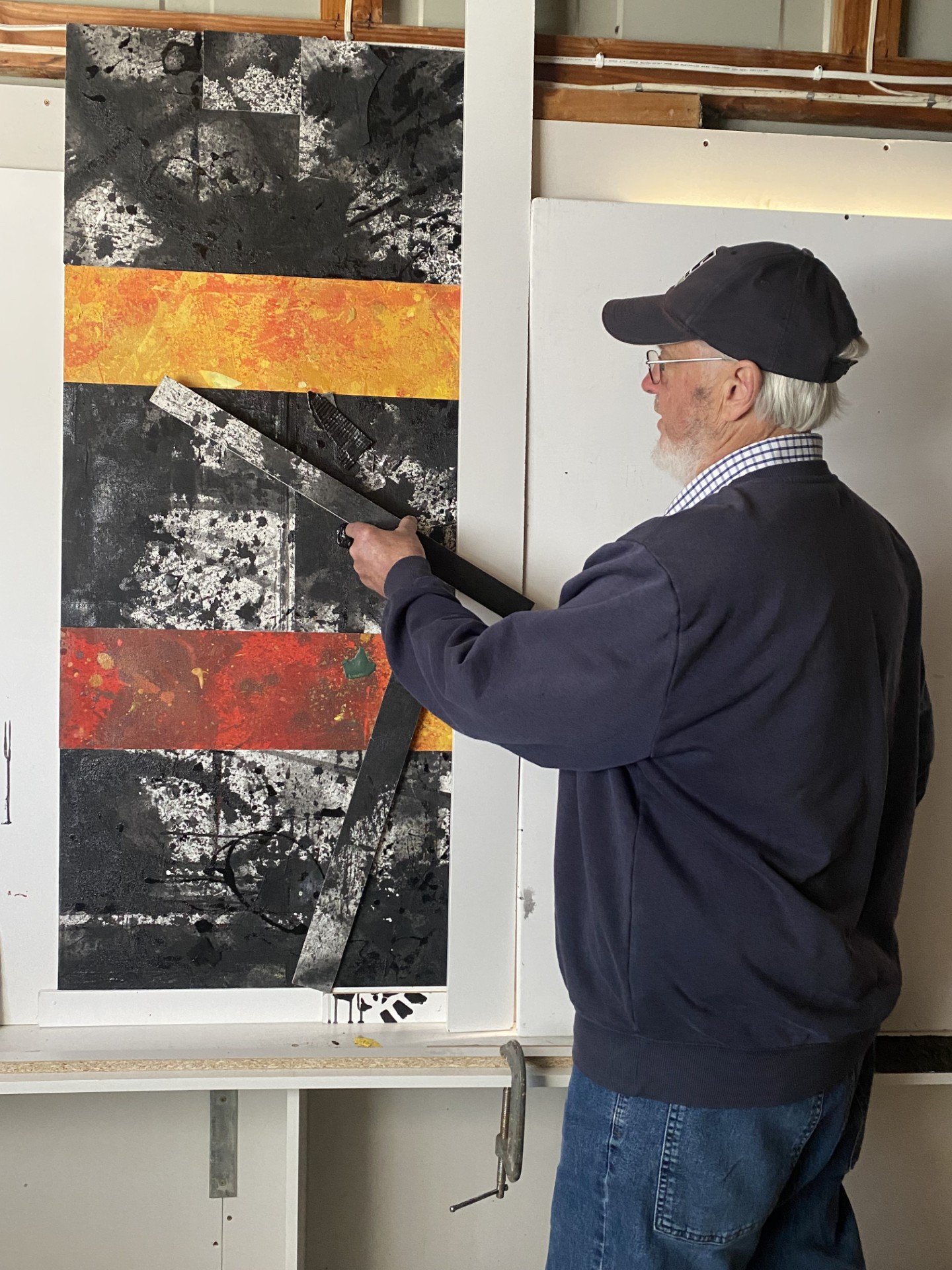 Waikouaiti artist Christopher Willmott with his painting titled Bushfire that will feature in the...