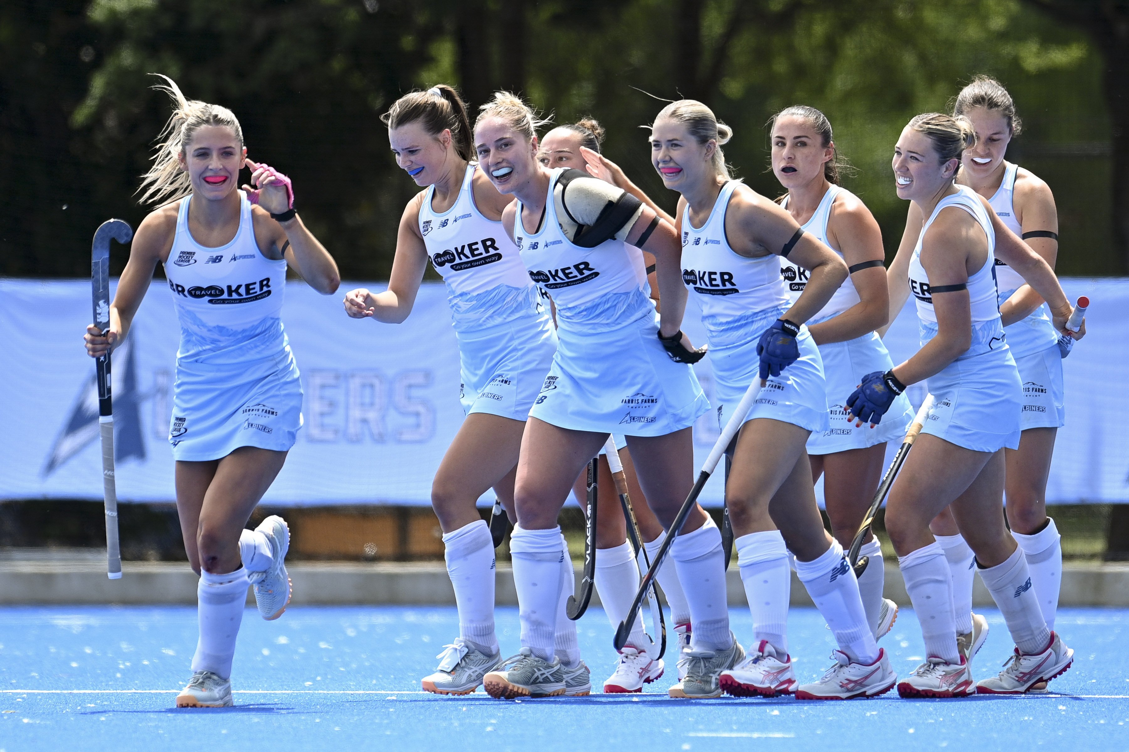 The Alpiners women celebrate one of Tessa Reid’s two goals against the Falcons at Nunweek Park in...