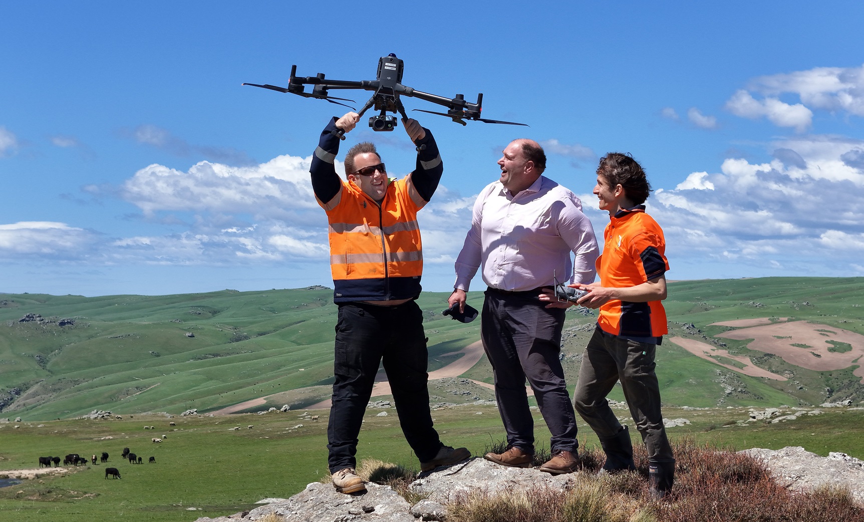 Pilot Chris Scoggins, of Interpine Pilots, holds aloft a new weapon in the fight against possums,...