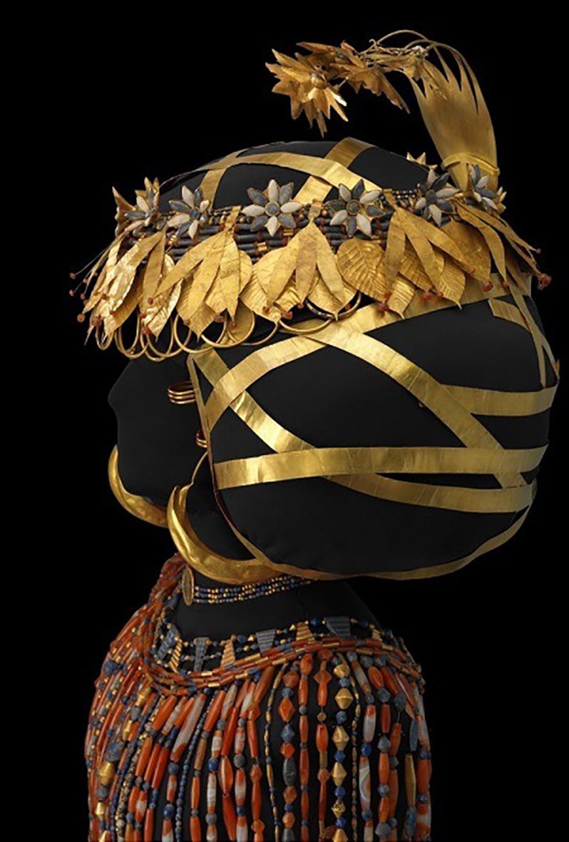 The golden headdress of Queen Pu-Abi. There are golden willow leaves and precious beads. She wore...