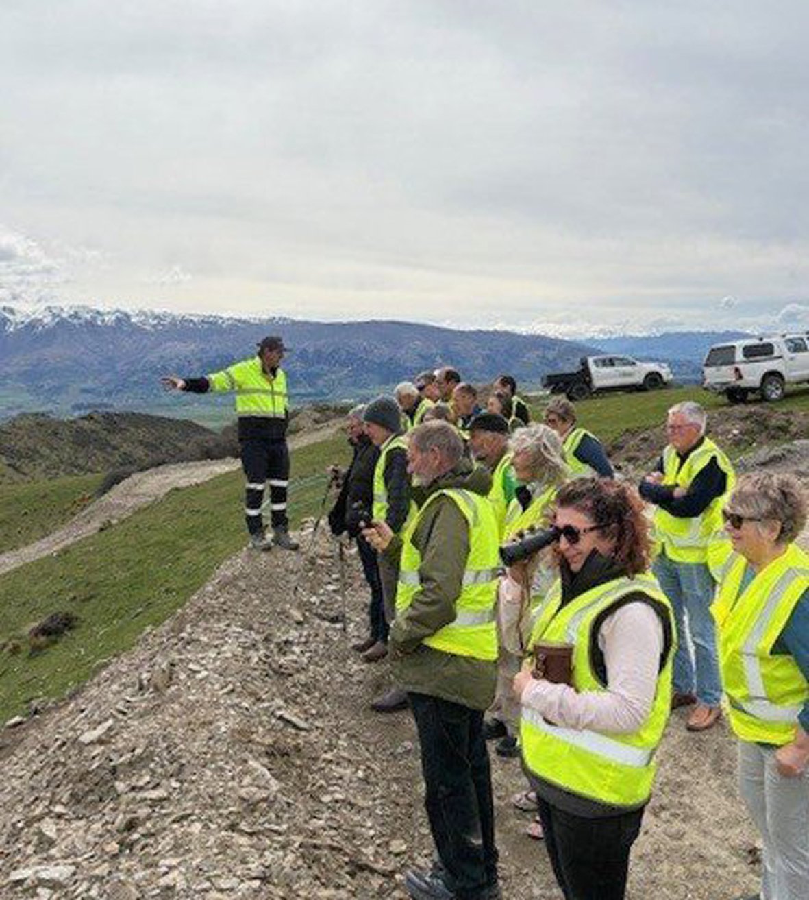 Otago Goldfields Heritage Trust members stand at the top of the Rise and Shine with Santana...