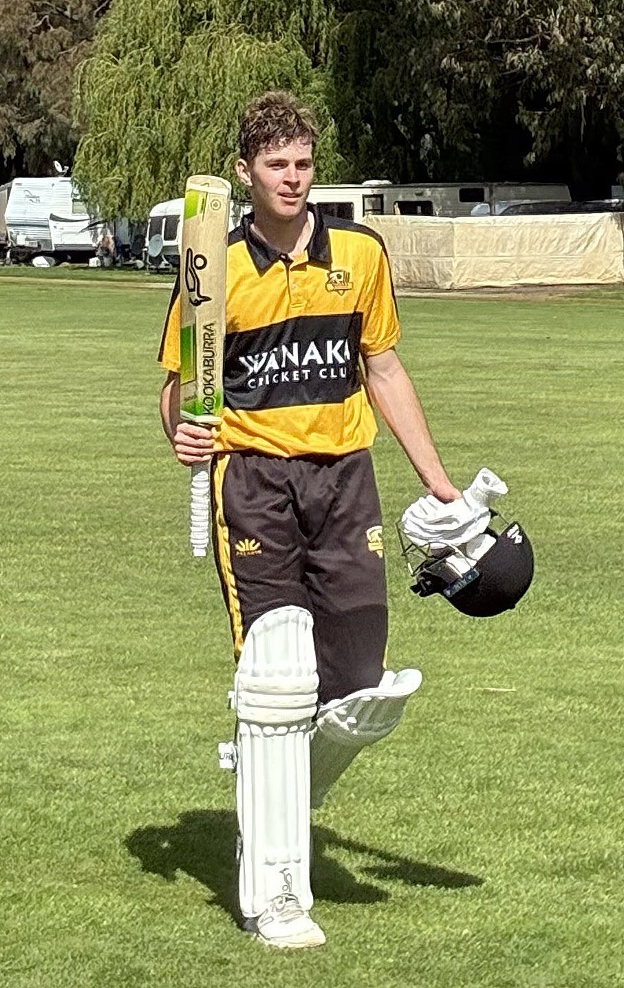 Sam Harper walks off the Luggate cricket ground after his double century on Saturday. PHOTO:...