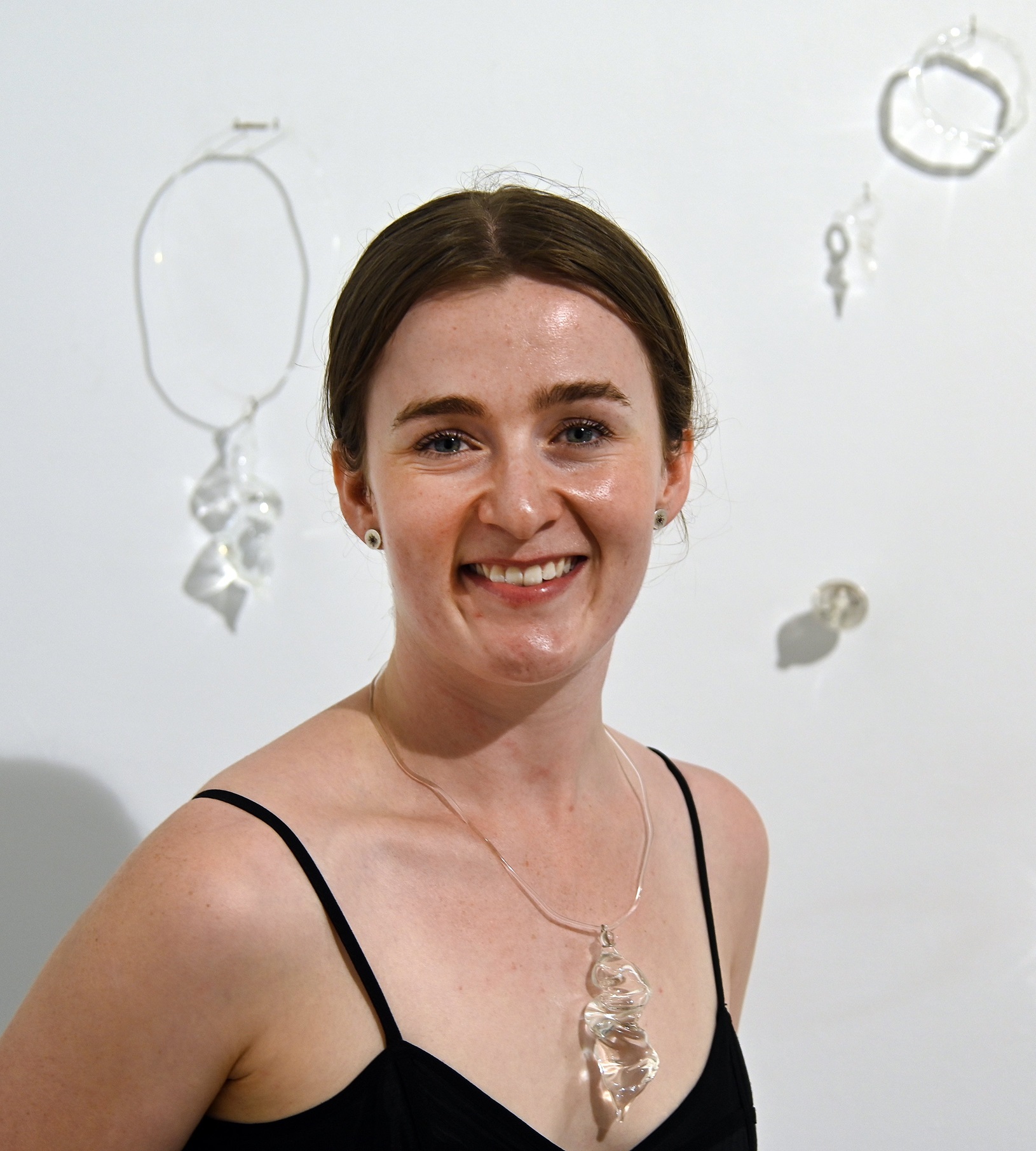 Aurora Smith wearing one of her necklaces. Photo: Craig Baxter