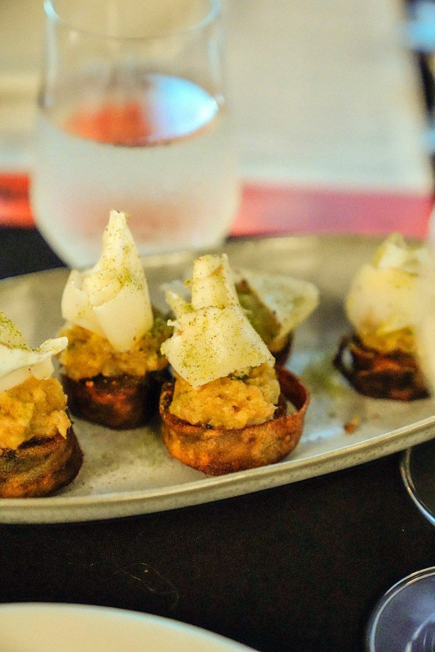 Sam Gasson’s potato pave, braised leak, Hannah’s lardo and kimchi.