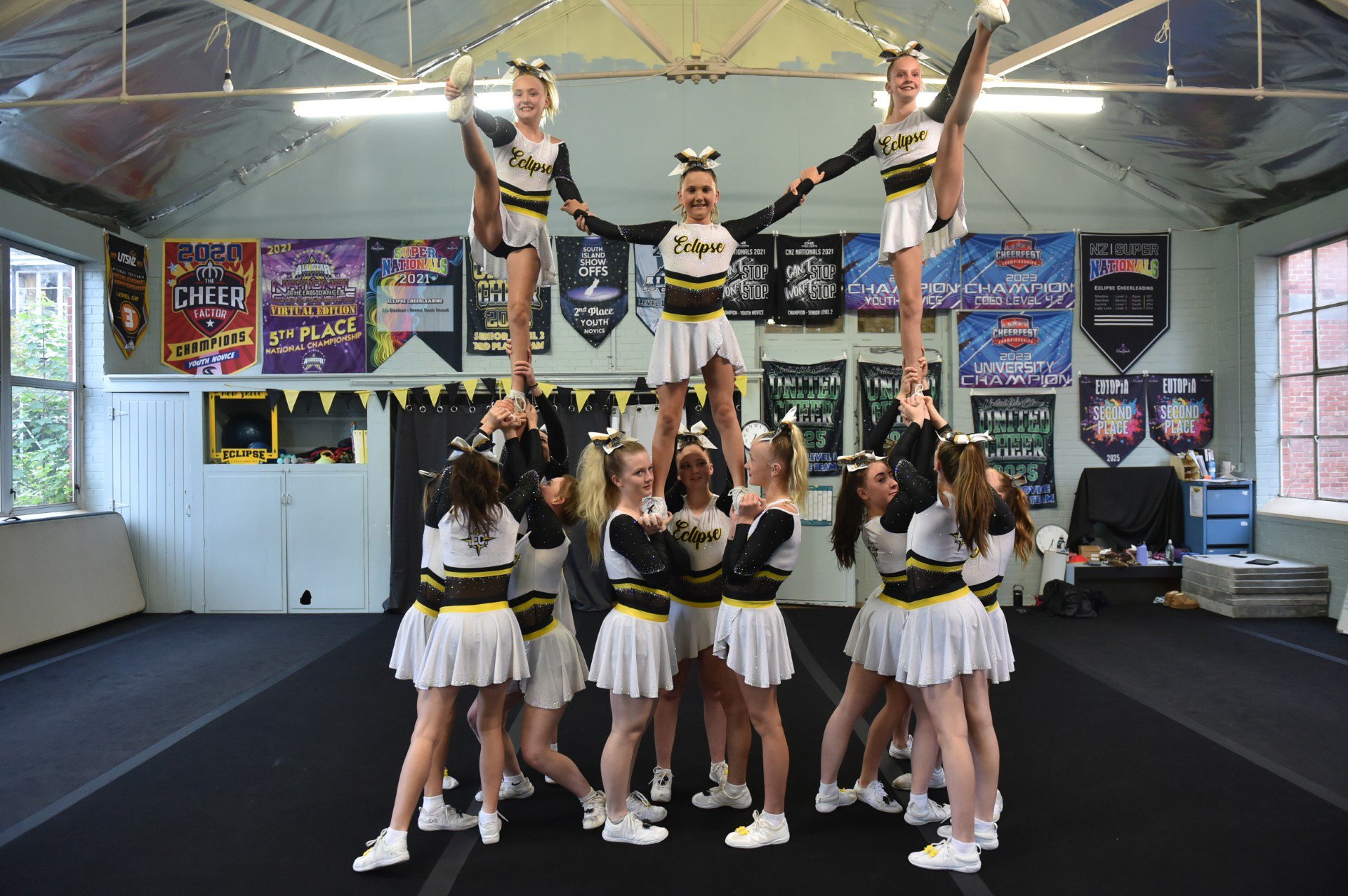 Eclipse Cheerleading level 2 team Luna show off some of their moves after their successful...