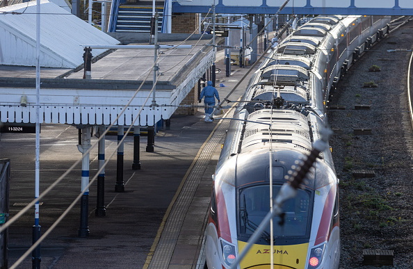 The train waits at Huntingdon Station following a stabbing attack as it made its way to London in...