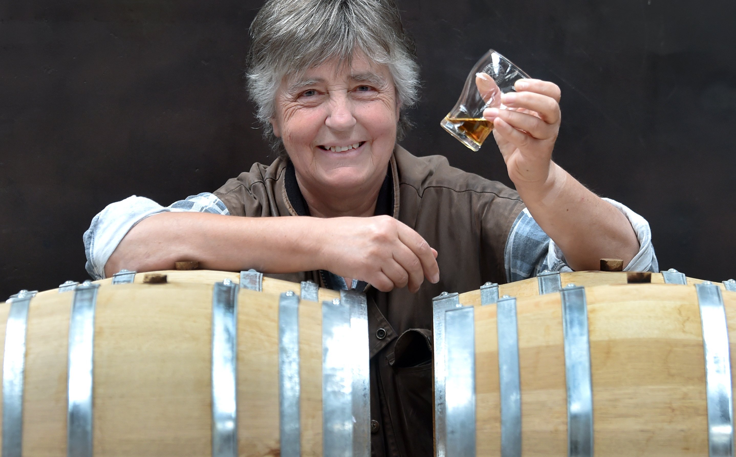 Dunedin Craft Distillers co-founder Jenny McDonald holds up a sample of the distillery’s...