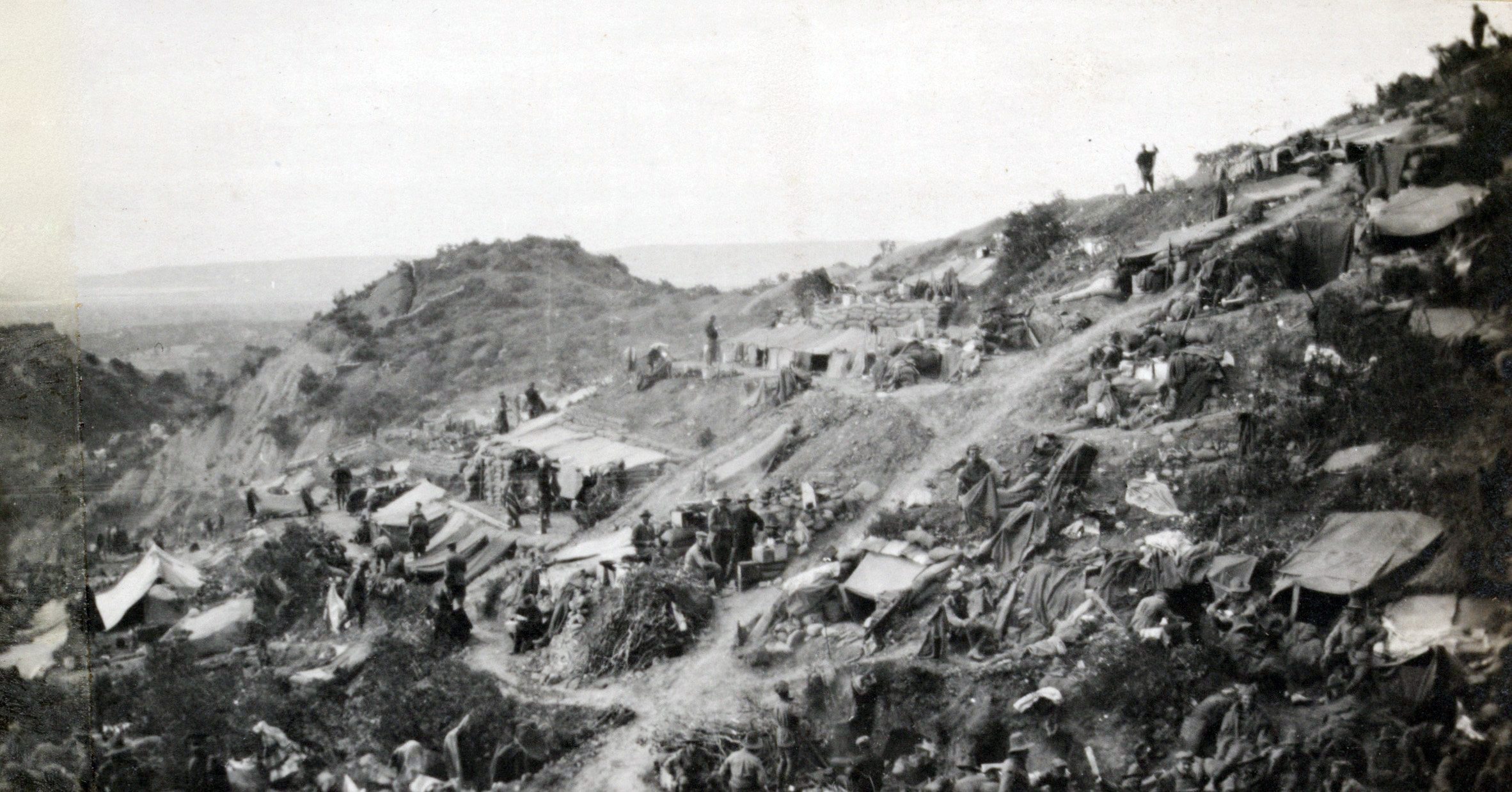 A view of dugouts on the side of the Chailak Dere along Bauchop’s Hill, Gallipoli, 1915. Salt...