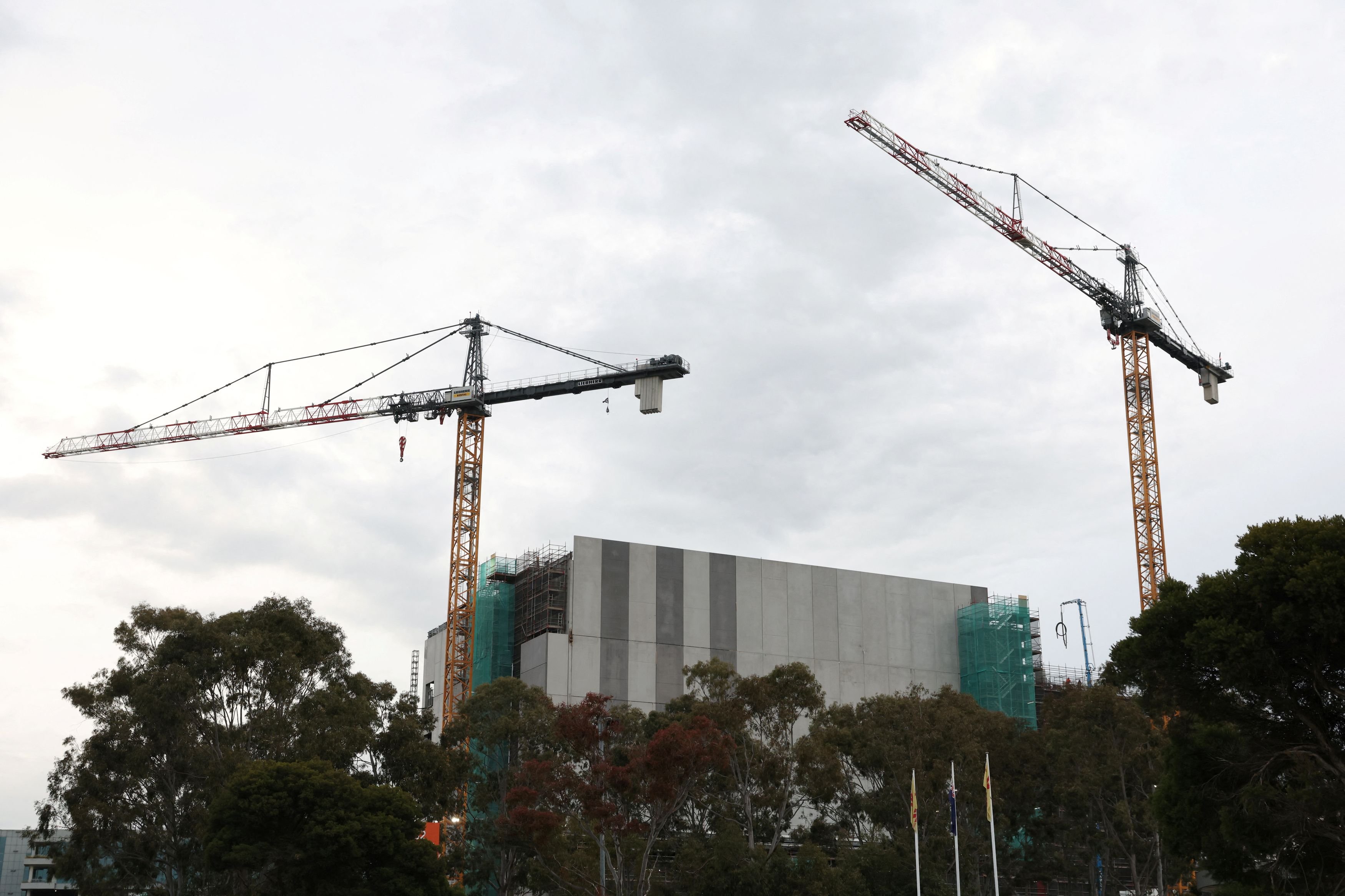 Cranes tower over the AirTrunk data centre under construction in Western Sydney. PHOTO: REUTERS