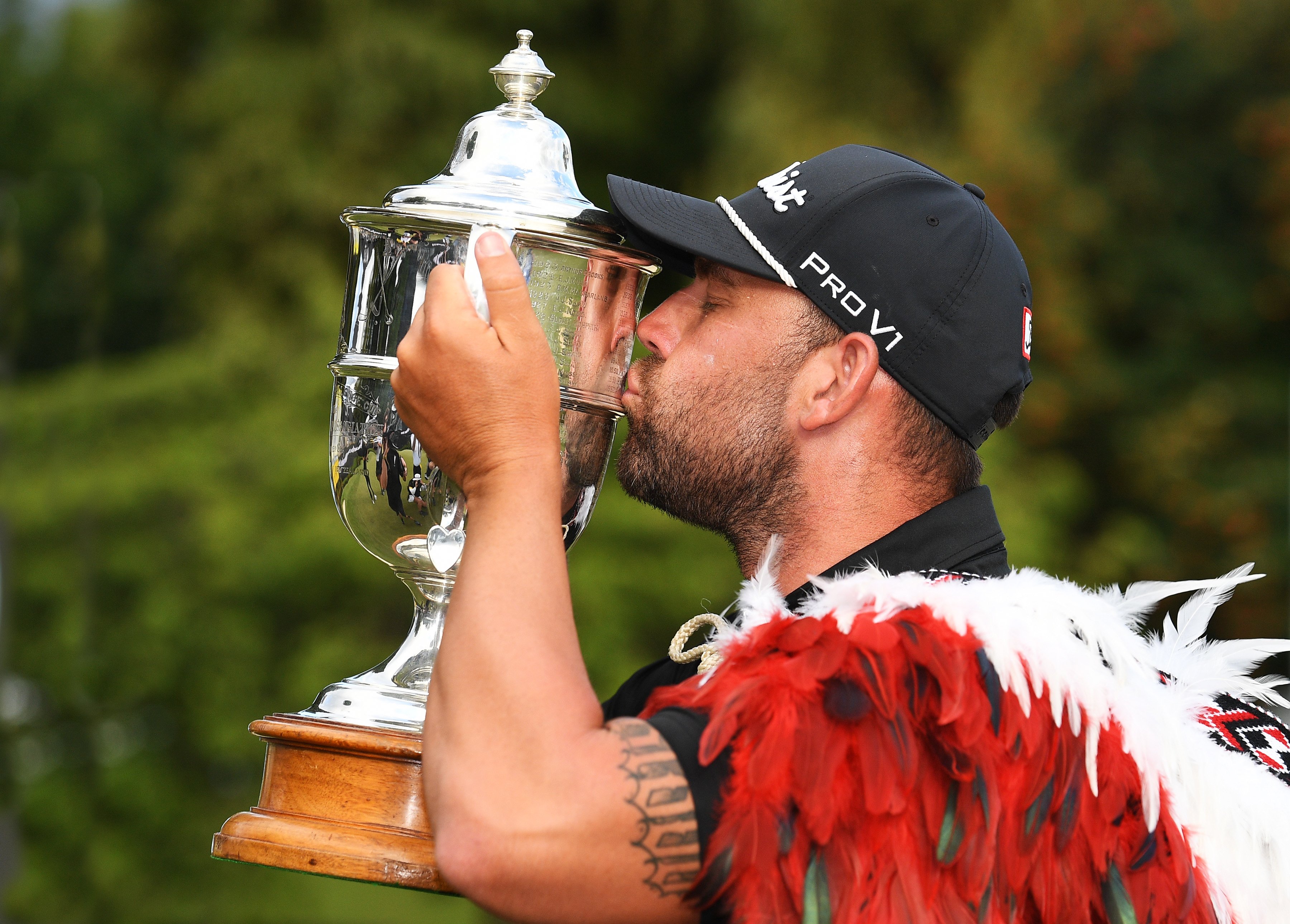 Ryan Peake kisses the Brodie Breeze Trophy at Millbrook after winning the 2025 New Zealand Open....