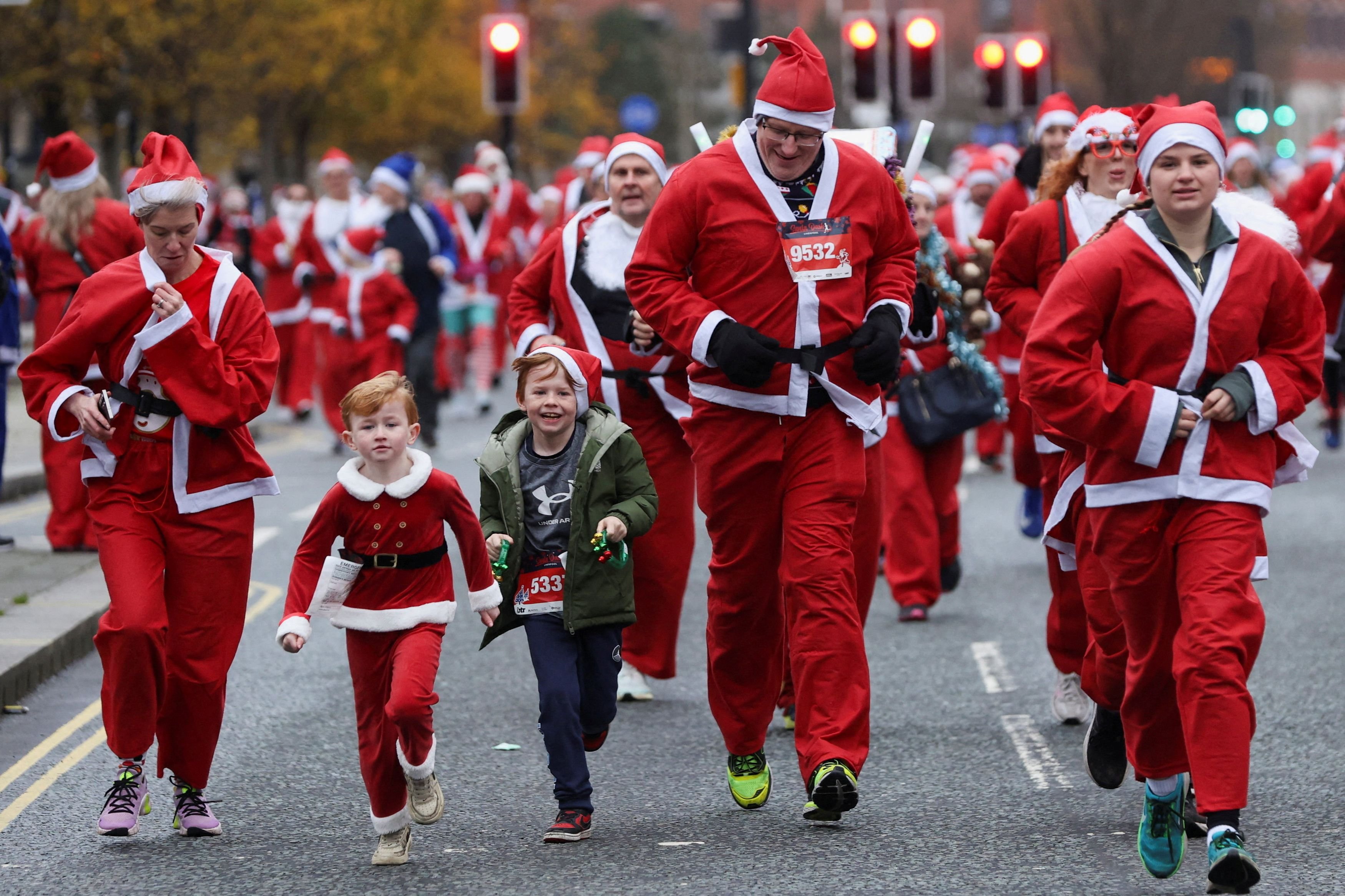 Runners take part in the annual 5km Santa Dash in Liverpool. PHOTO: REUTERS