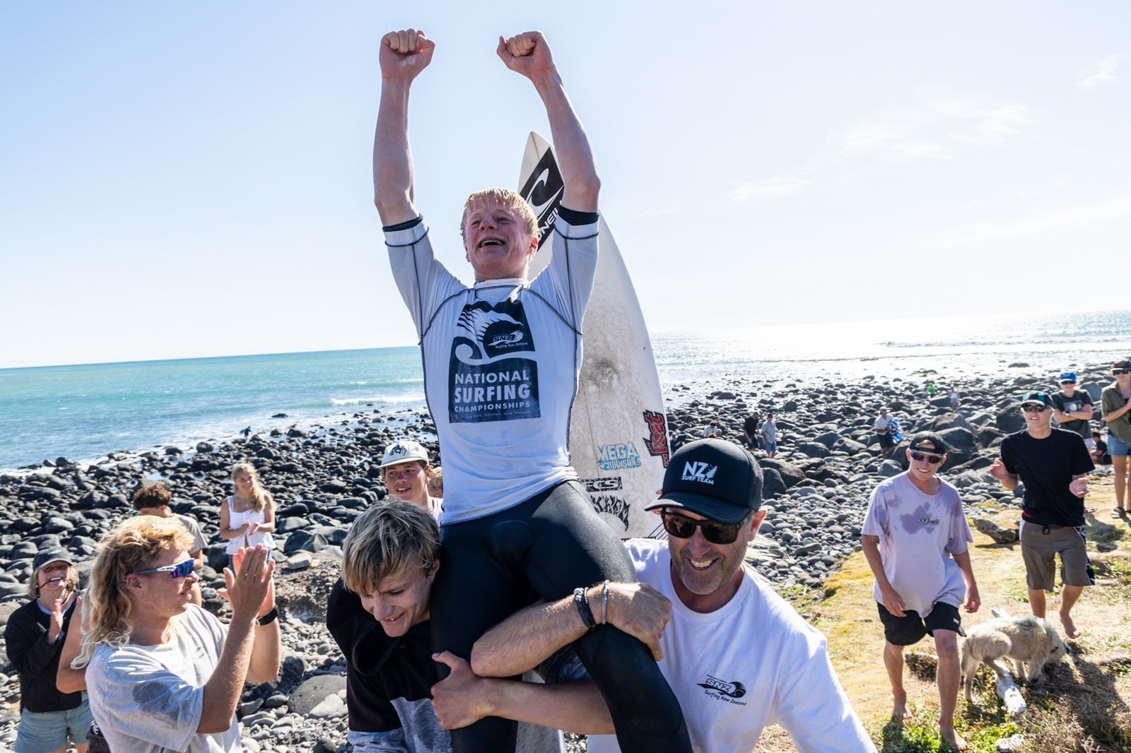 Dunedin surfer Alexis Owen is hoisted aloft after winning the New Zealand open men’s title on the...