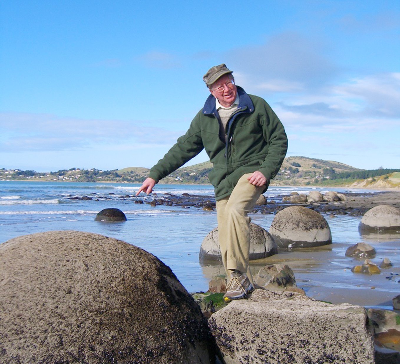 Mr Rutledge at the Moeraki Boulders.