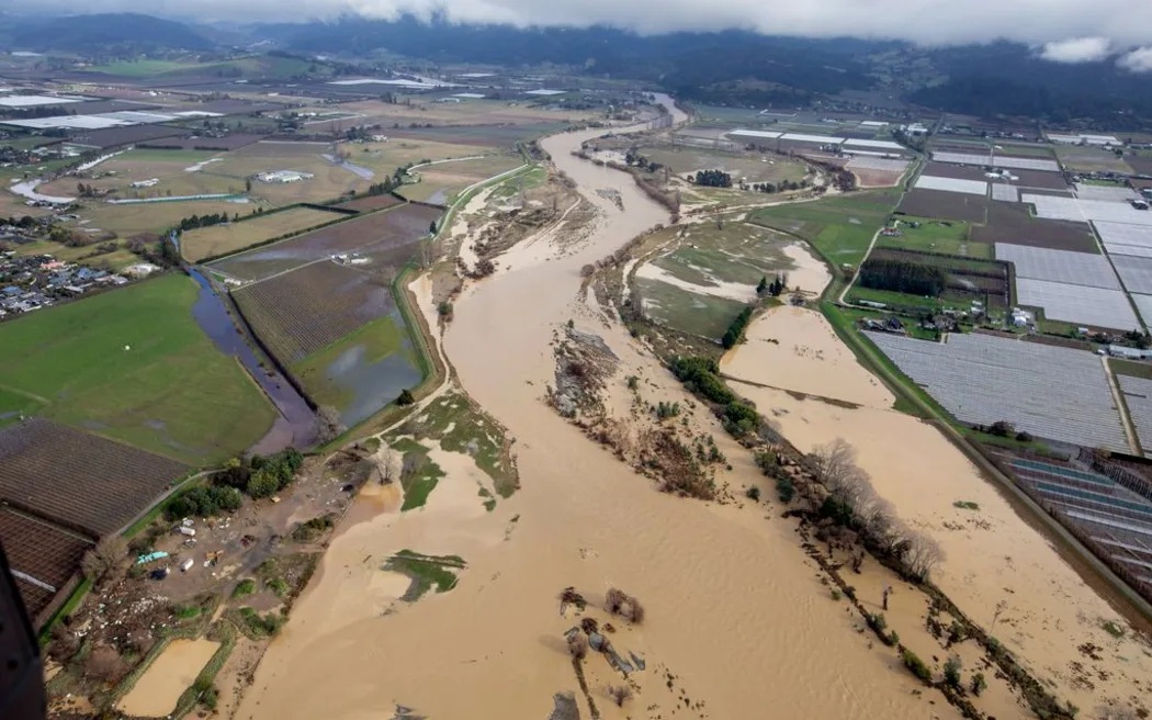 An aerial image showing the extent of flooding in Tasman. Photo: Tim Cuff / Pool