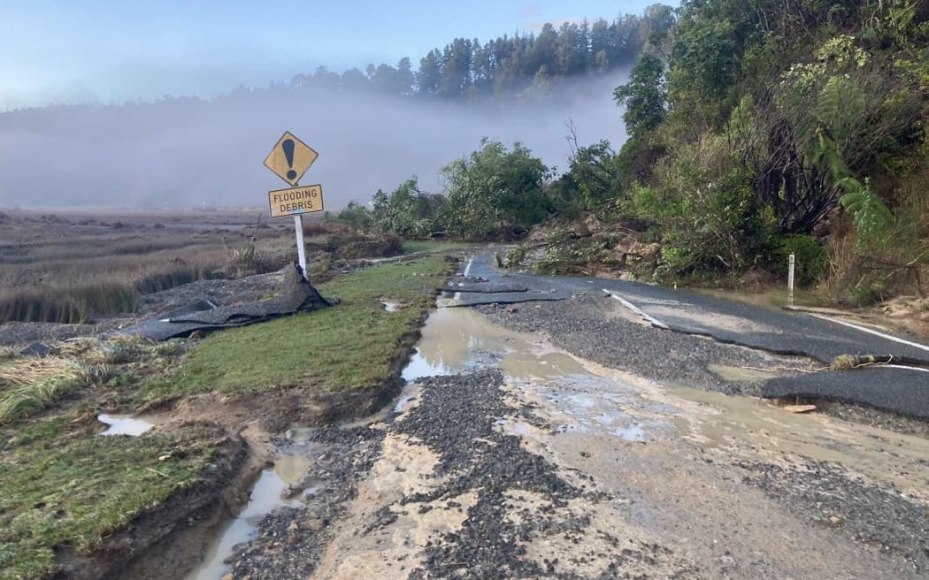Flooding and damage in Otuwhero Valley and Sandy Bay Rd near Marahau, during extensive floods in...