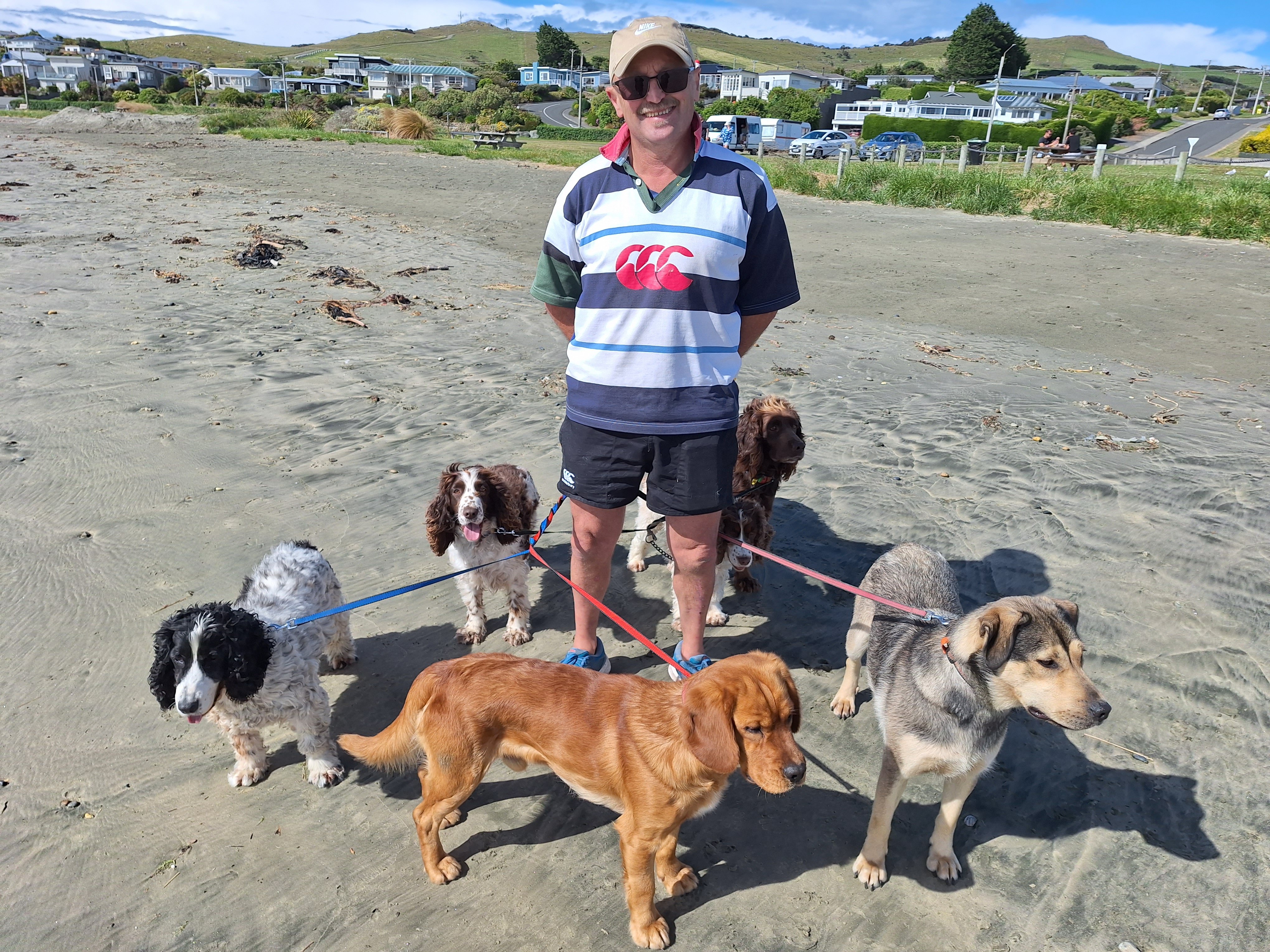 Jock Hamlin, of Winton, takes his six pooches on their annual Christmas Day walk around Taramea...