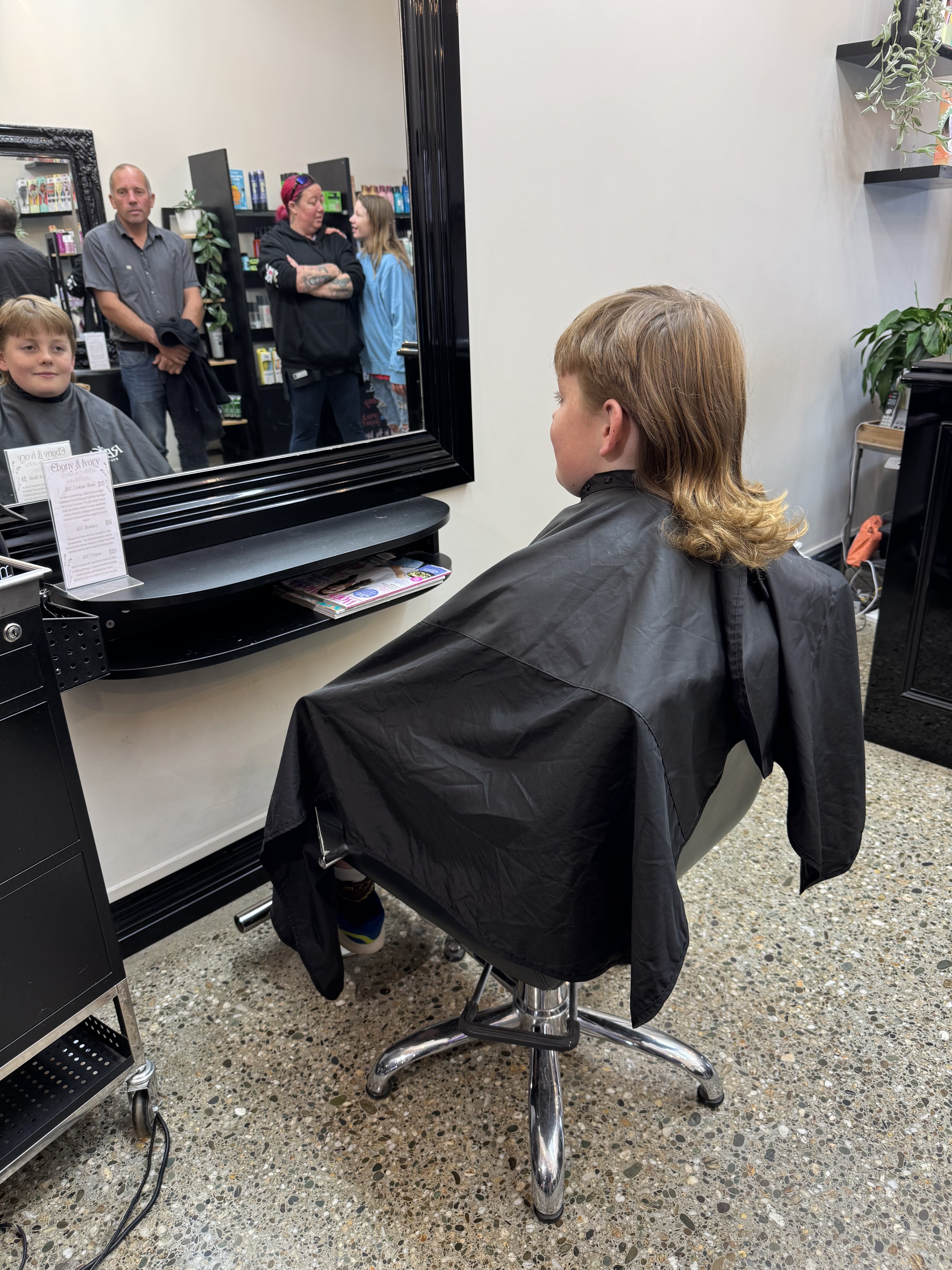 Jacob Grimm, 11, about to have his mullet cut to raise funds for Epilepsy New Zealand in the...