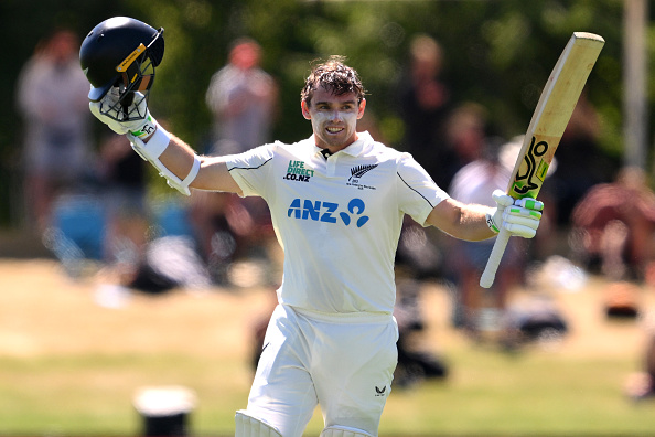 Black Caps skipper Tom Latham celebrates scoring a century at his home ground, Hagley Oval, today...