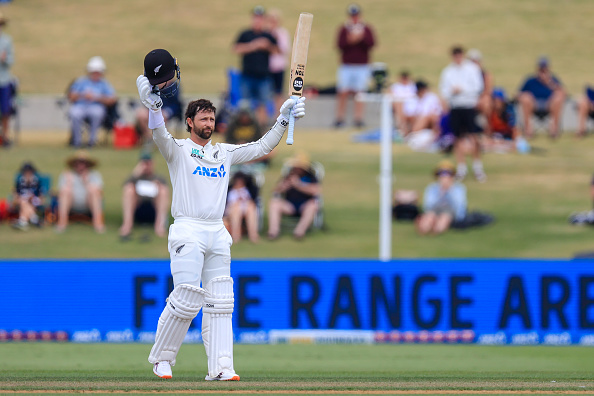 New Zealand's Devon Conway celebrates reaching his double century against West in Mount Maunganui...