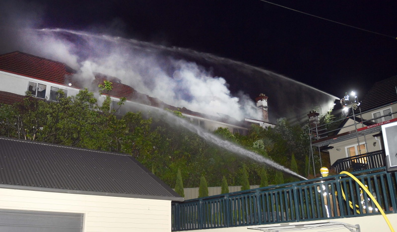 Firefighters battle the blaze at Glamis Private Hospital this morning. Photo: Stephen Jaquiery