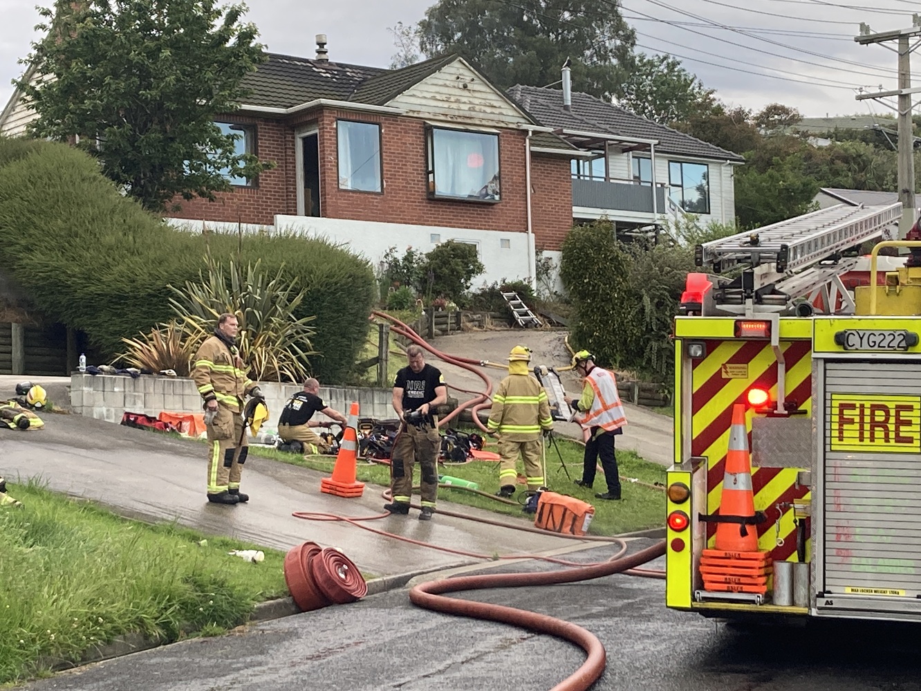 Firefighters at the scene in Green Island this morning. Photo: Stephen Jaquiery