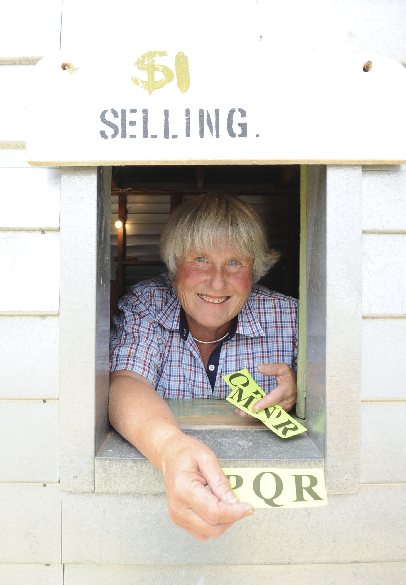 Judy Muir works the tote at the Hawea Picnic Races in 2012. PHOTO: ODT FILES