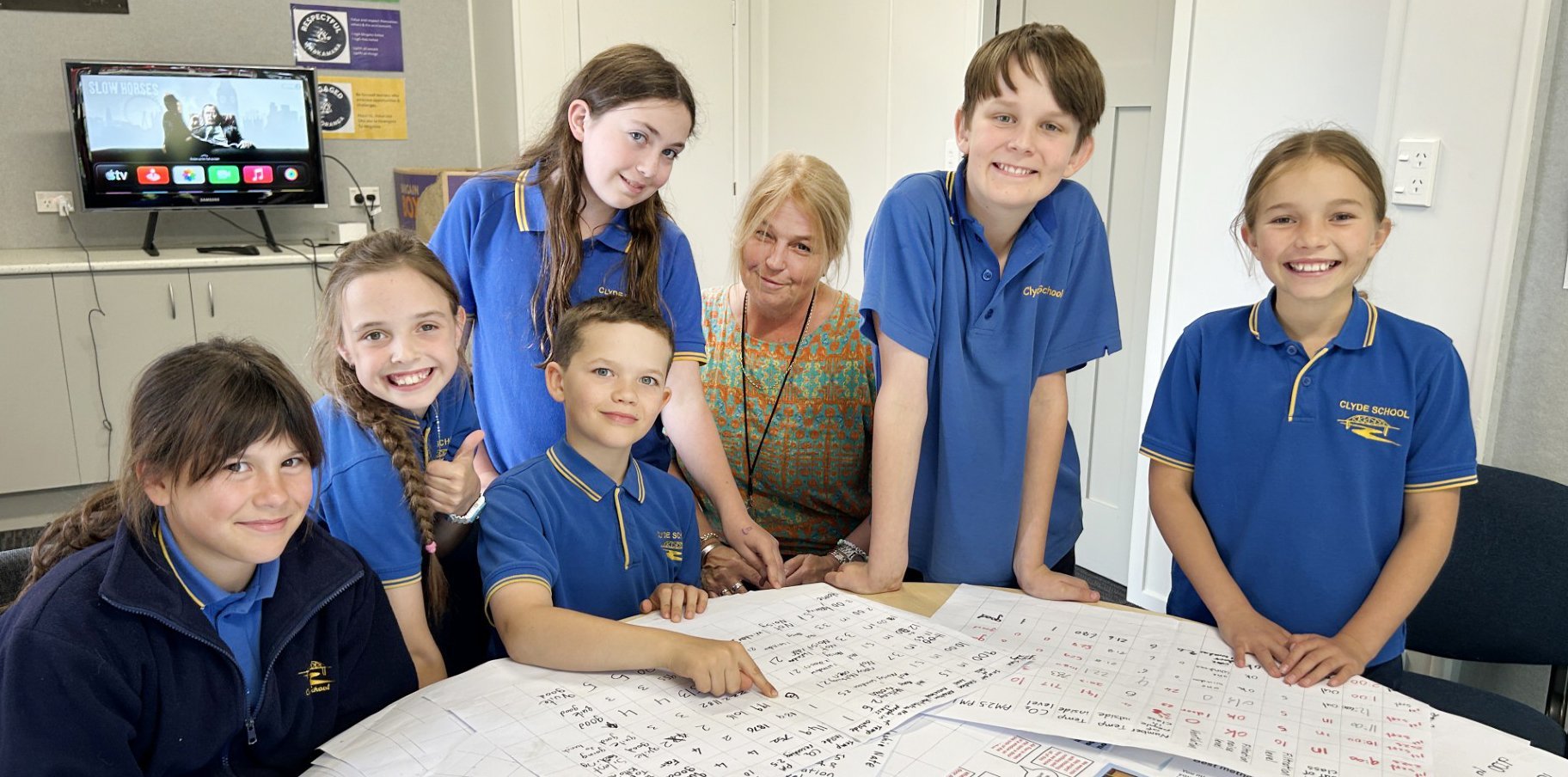Reviewing the data from their air quality project are Clyde Primary School pupils (from left)...