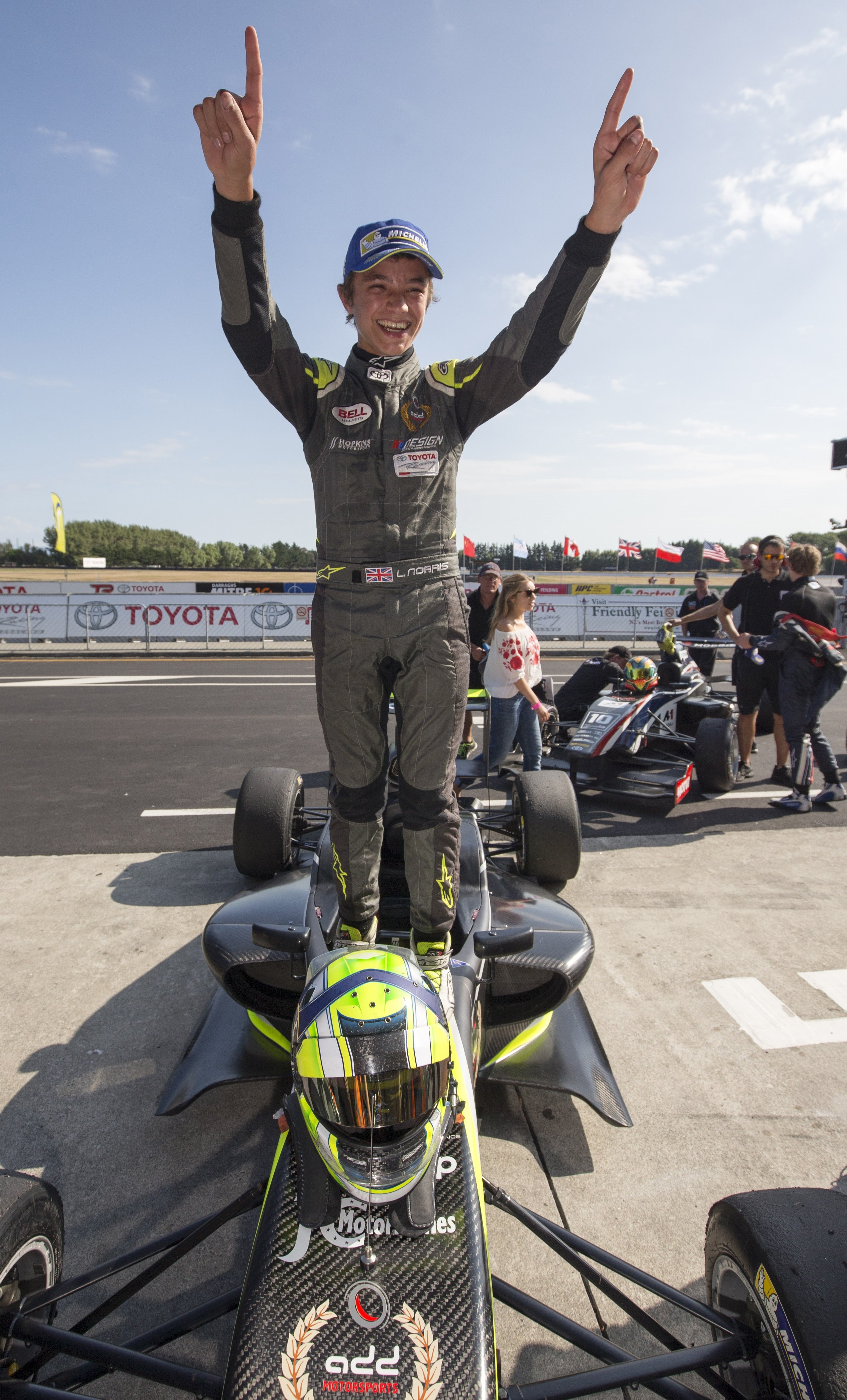 Lando Norris celebrates after winning the Toyota Racing Series at the New Zealand Grand Prix in...
