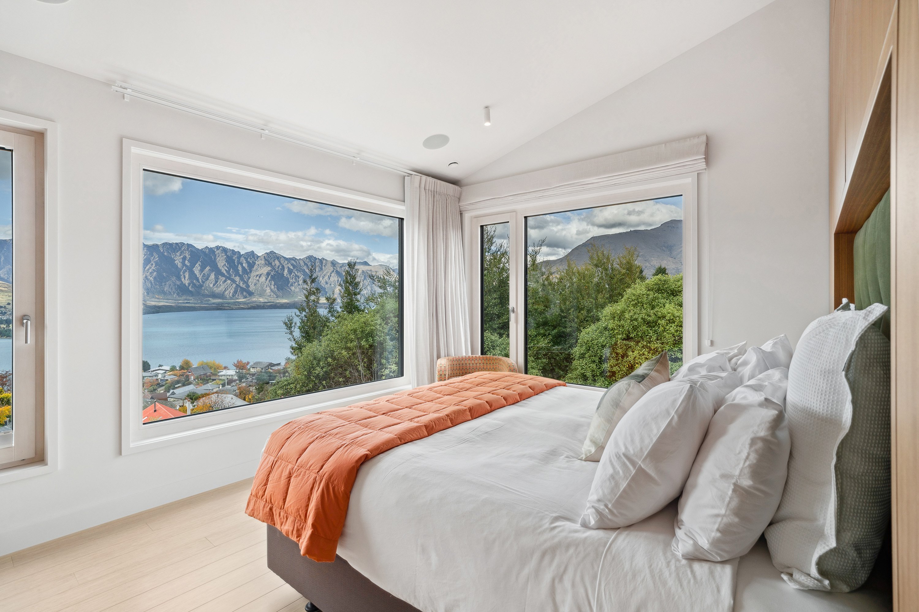 The formerly dark and dilapidated house has been transformed into a sun-filled home with...