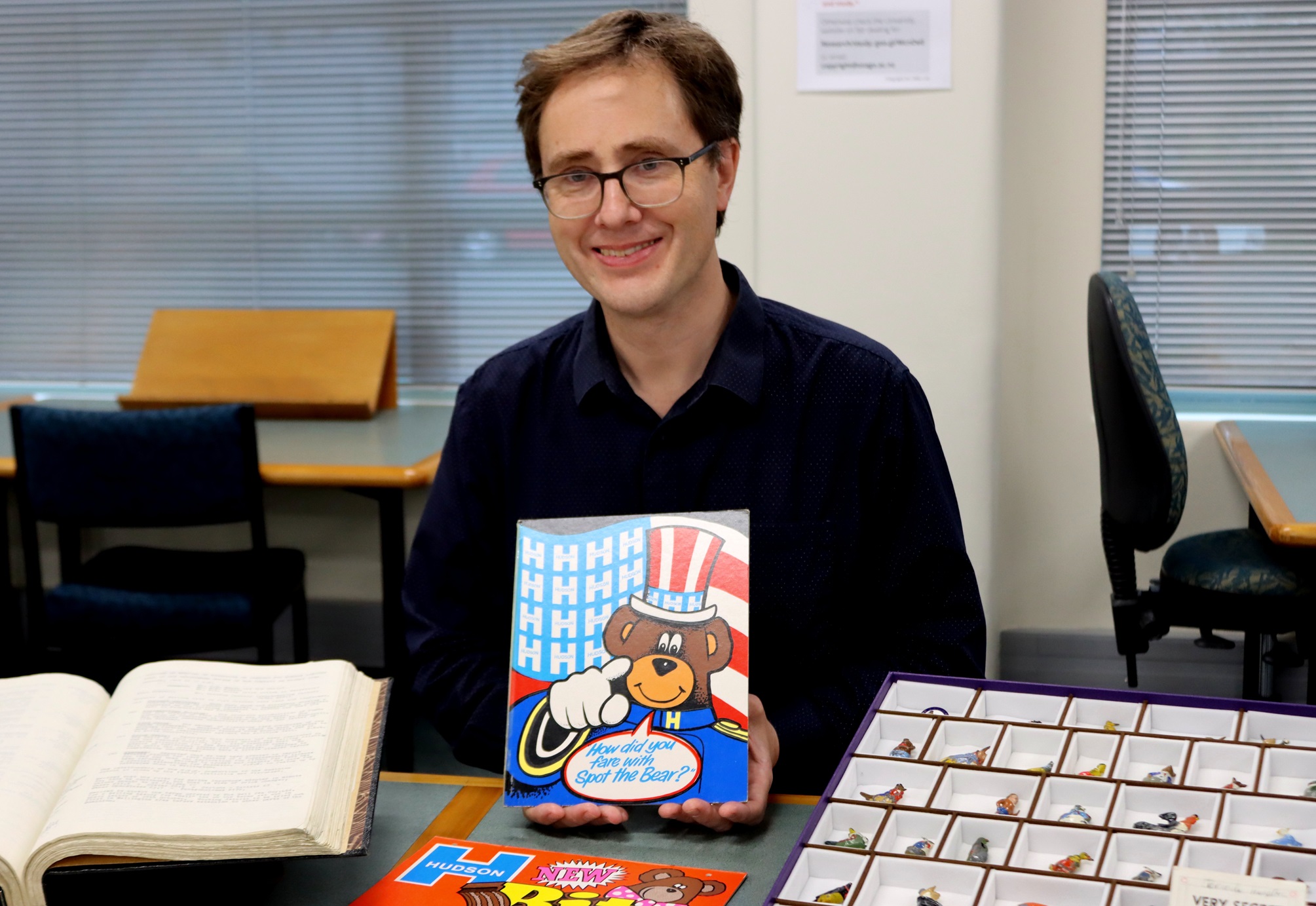 Hocken Collections Uare Taoka o Hākena archivist David Murray shows an image of the Hudson’s...