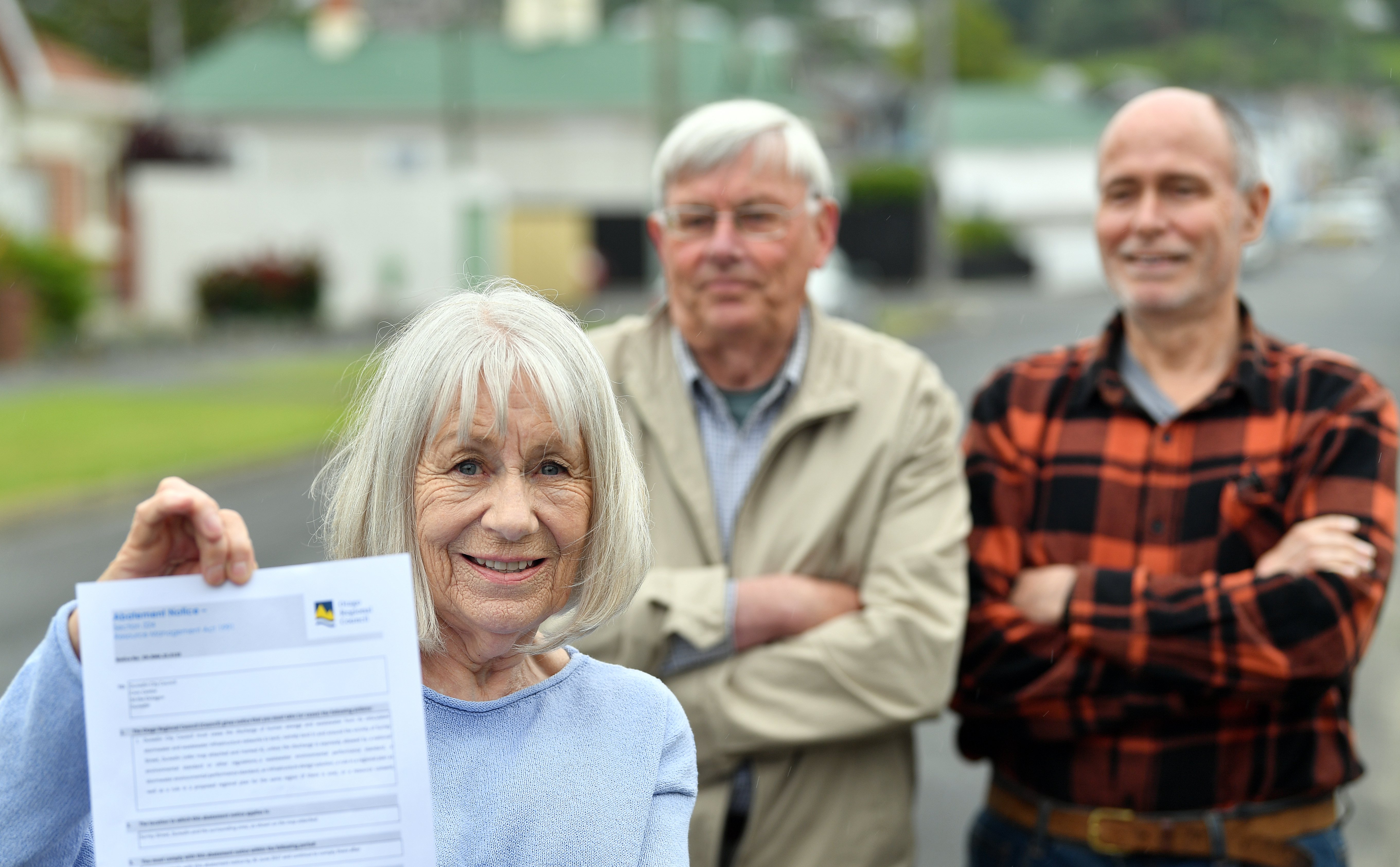 Surrey Street Flood Action Group convener Lynne Newell and members Neil Johnstone (centre) and...
