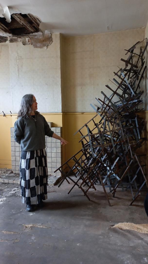 Paula Collier with her Scrap Tree made from repurposed metal cages displayed in the Tees St...