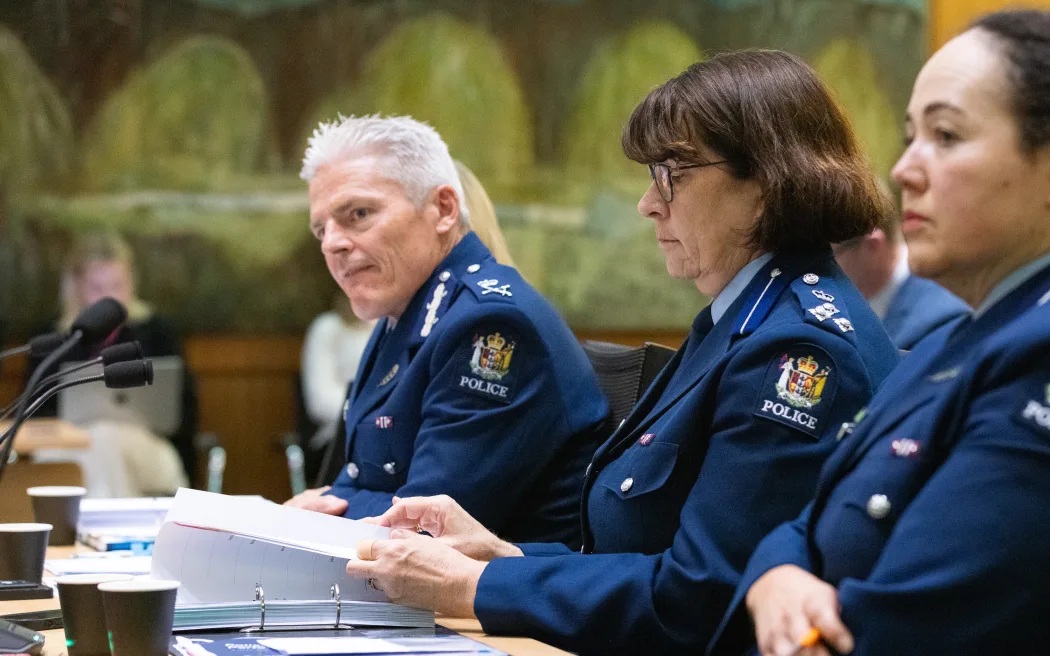 Answering questions from Parliament's Justice Committee are (from left) NZ Police Commissioner...