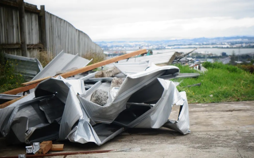 The roof of an unoccupied home in the Auckland suburb of Hillsborough came off in high winds and...