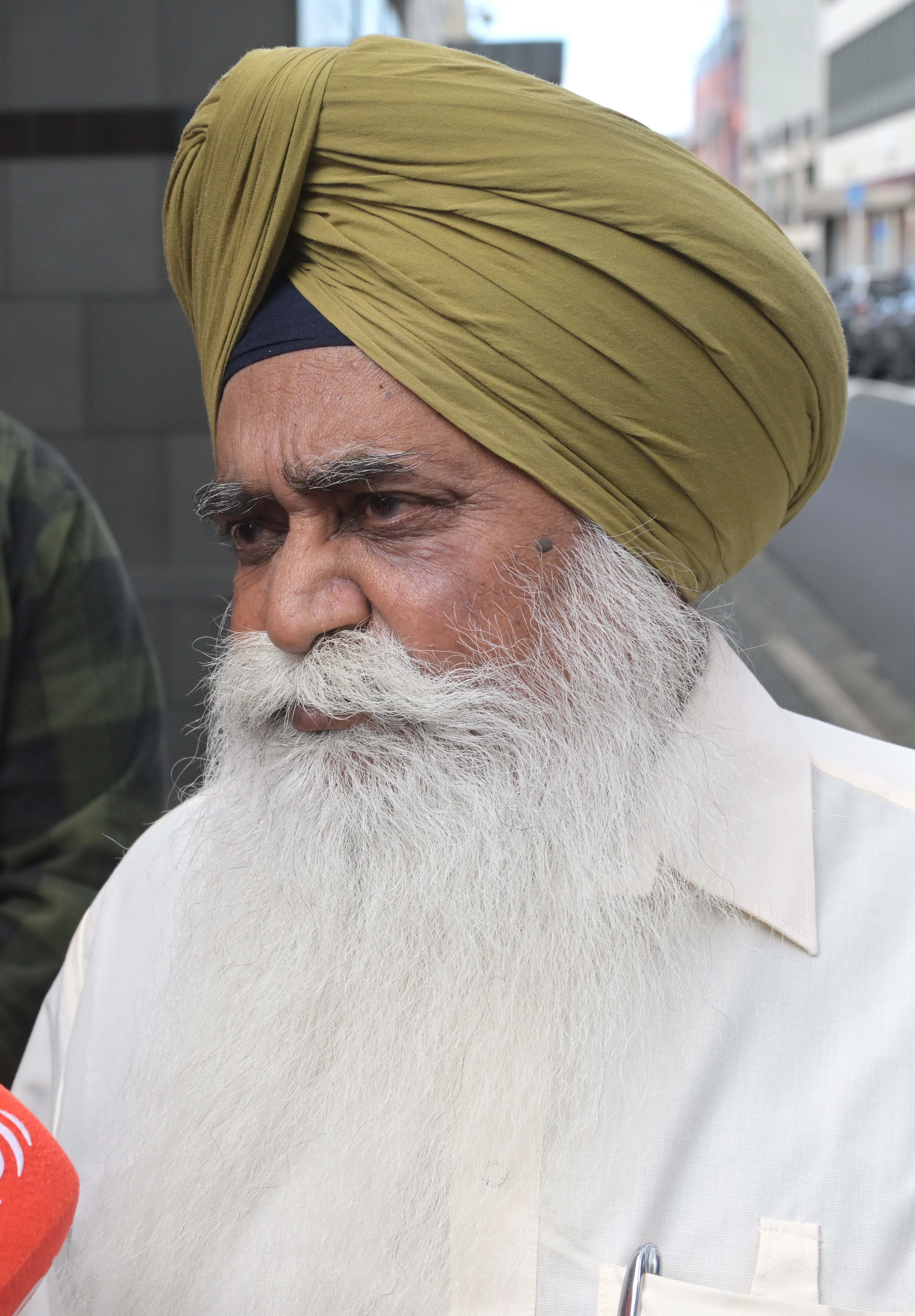 Gurjit Singh's father, Nishan, speaking outside court yesterday. PHOTO: GERARD O'BRIEN