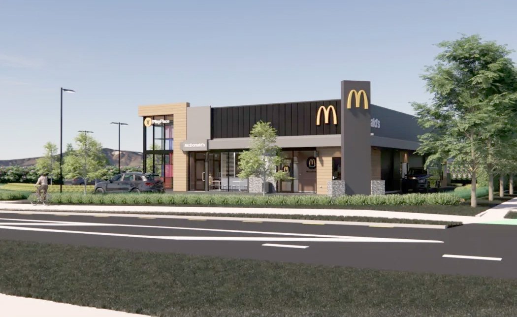 An artist's impression of the proposed McDonald's in Three Parks, where its neighbours may...