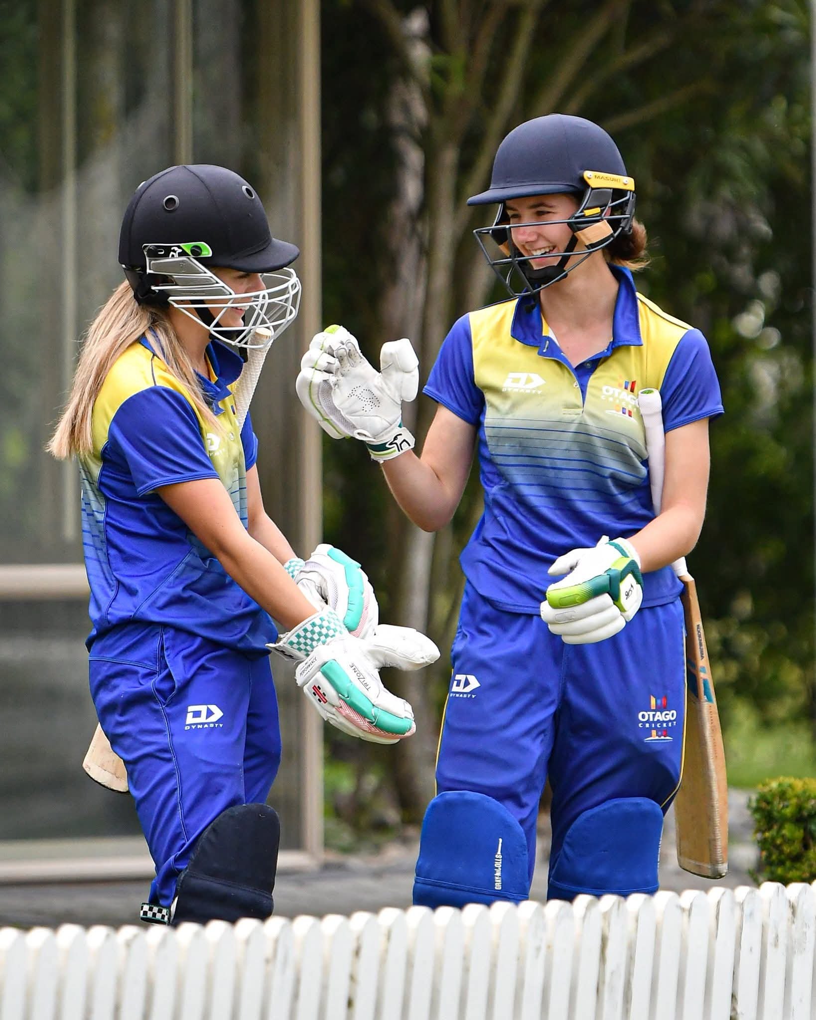 Local batters Honor Gilbert, left, and Abby Fookes opened the batting for Otago at the recent...