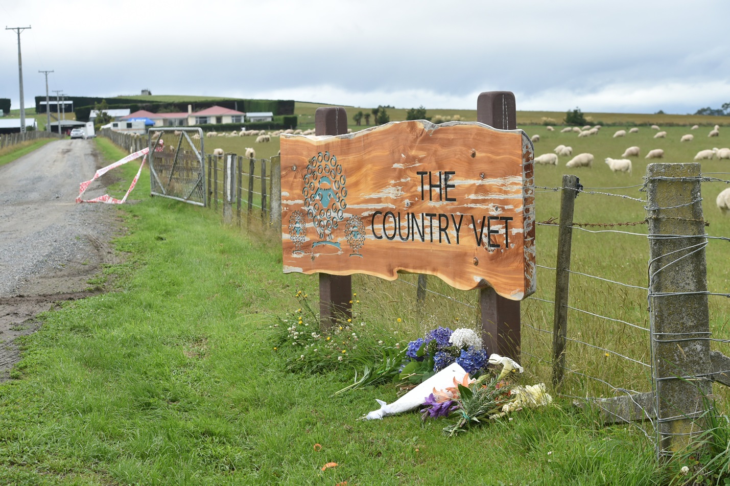 Bunches of flowers have been laid at the entrance to the Crichton property. Photo: Gregor...