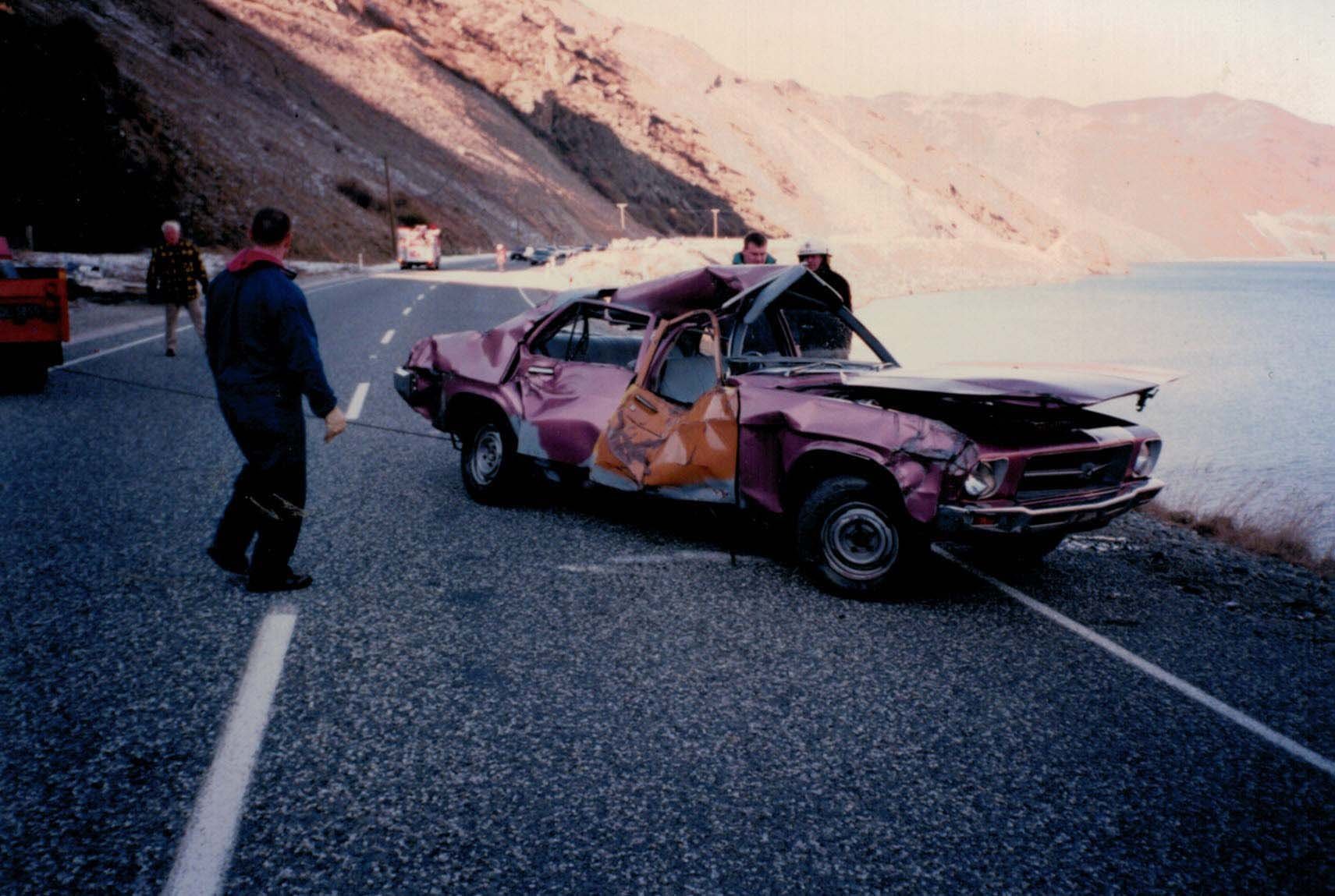 Attending a motor vehicle accident by the lake shore.