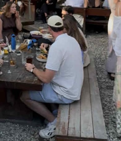 Police are trying to identify the man in the cap following a coward-punch assault after a wedding...