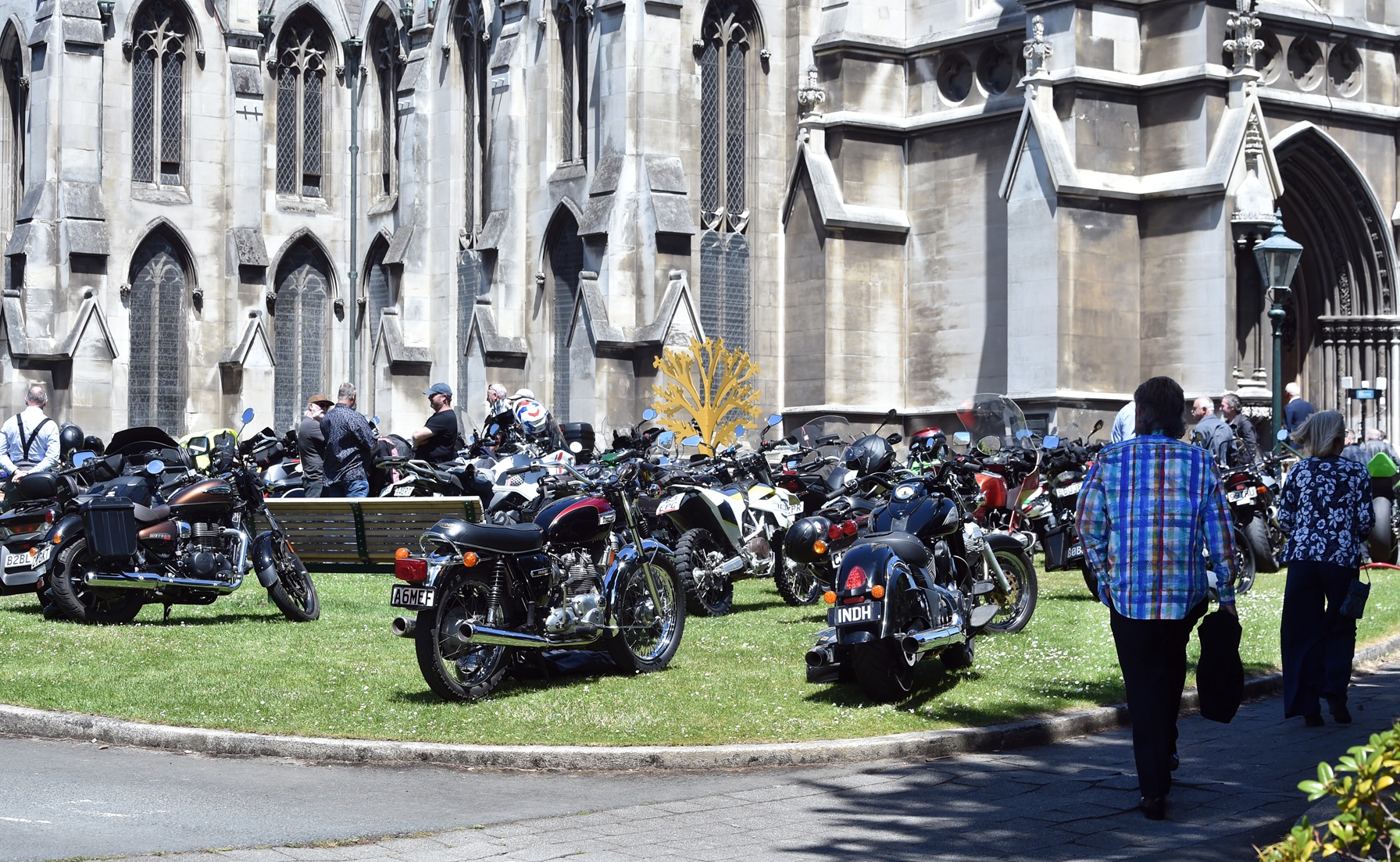 Motorcycles parked outside First Church in Dunedin as mourners gather to farewell former city...