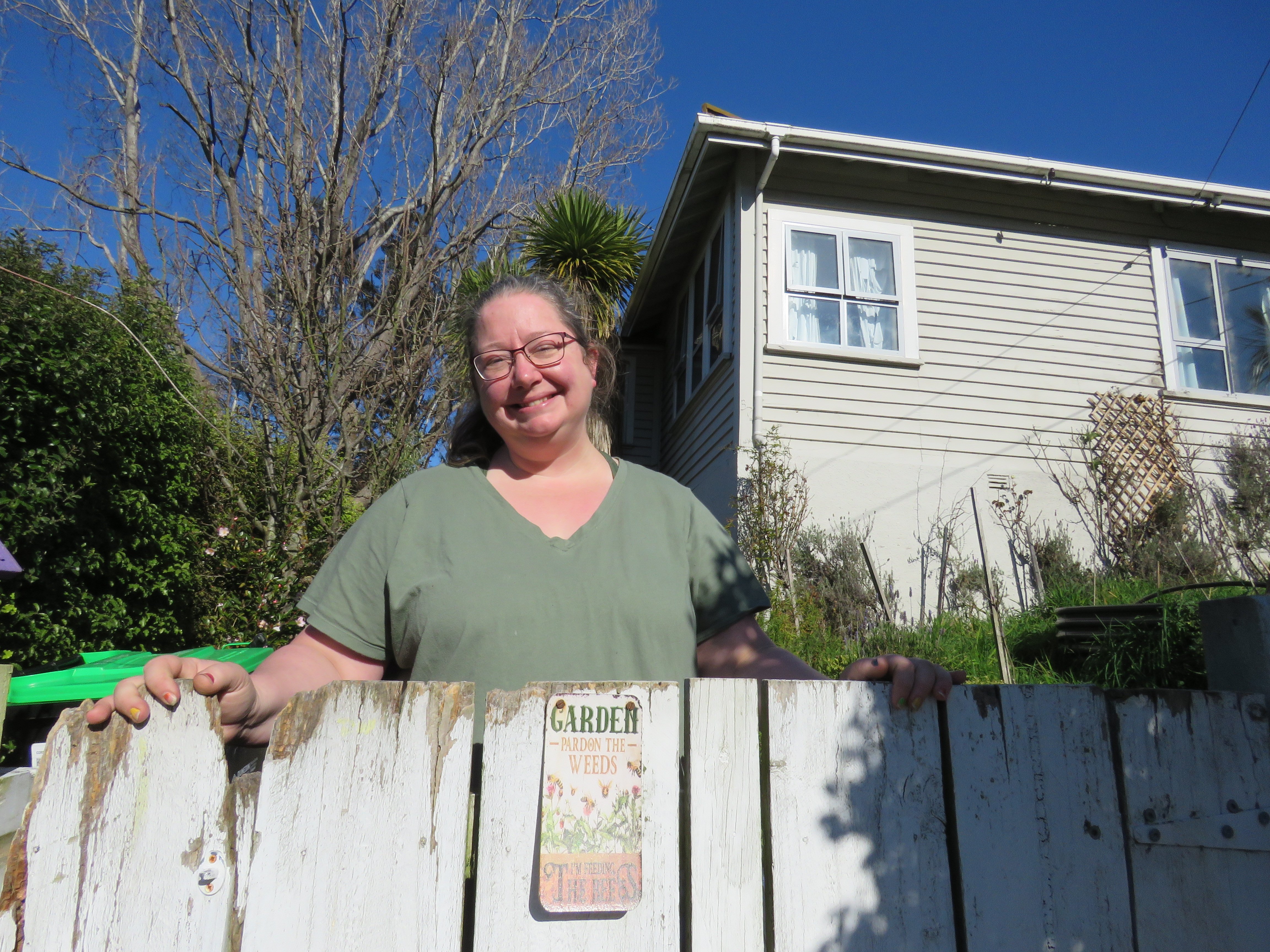 Jenny’s garden gate sign says: ‘‘Pardon the weeds I’m feeding the bees’’. PHOTO: MAUREEN HOWARD