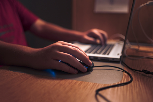 The coroner referenced Australia's recent decision to ban children under 16 from accessing social...