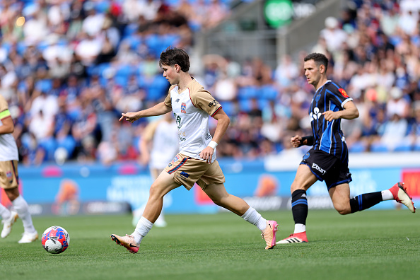 Will Dobson of the Newcastle Jets takes on the Auckland FC defence in their match at Mt Smart...