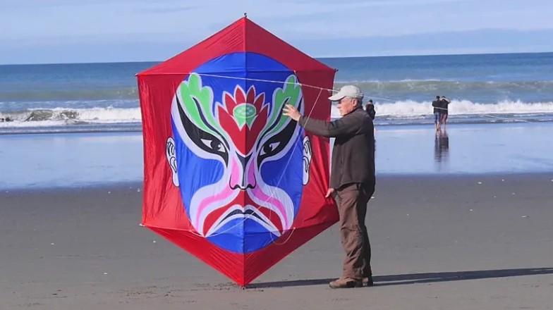 Jim Nicholls with a giant rokkaku kite. Photo: Jim Nicholls
