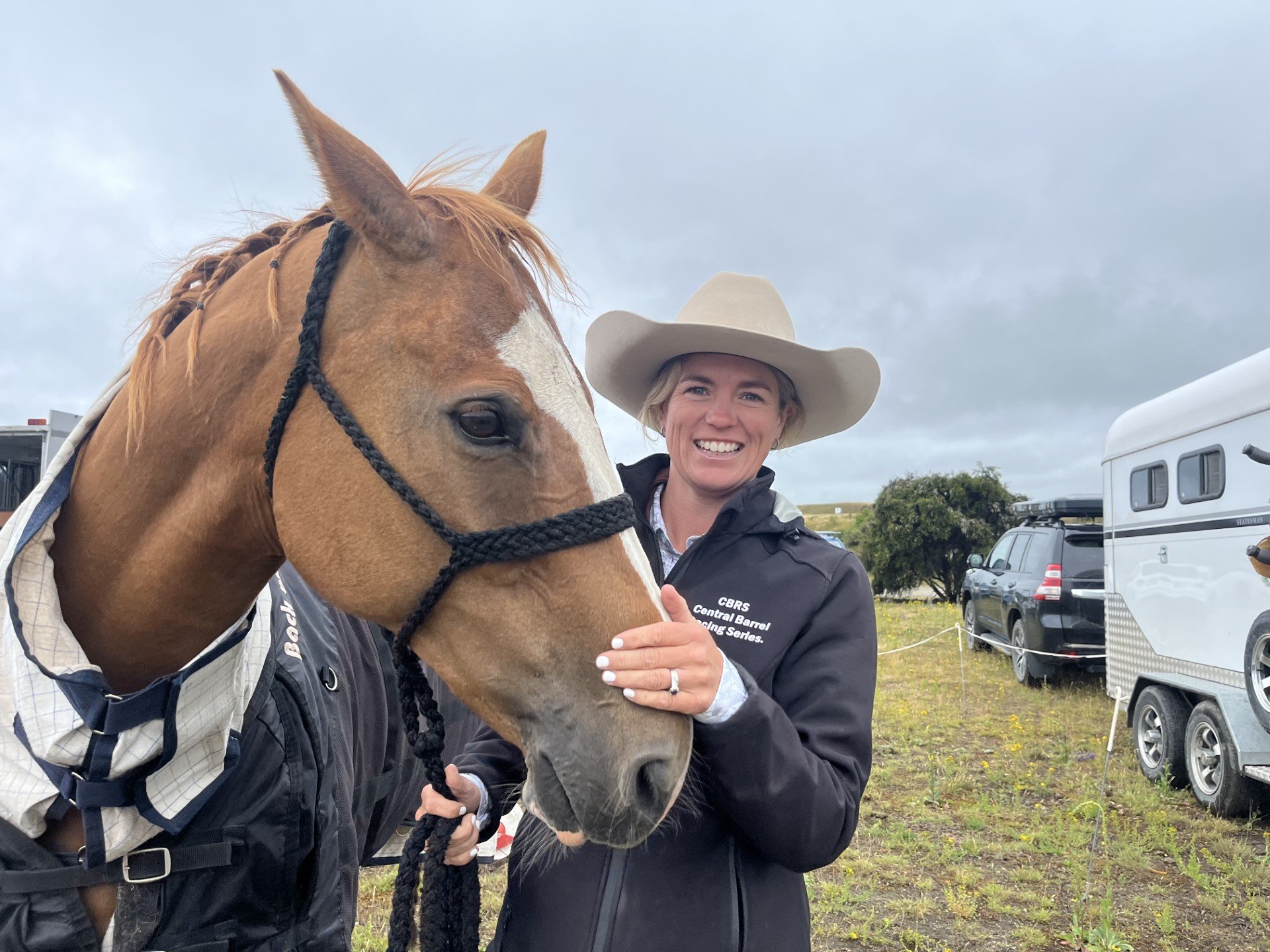 Kim Richards, of Alexandra, leads her horse Spur before competing in the open women’s barrel race...