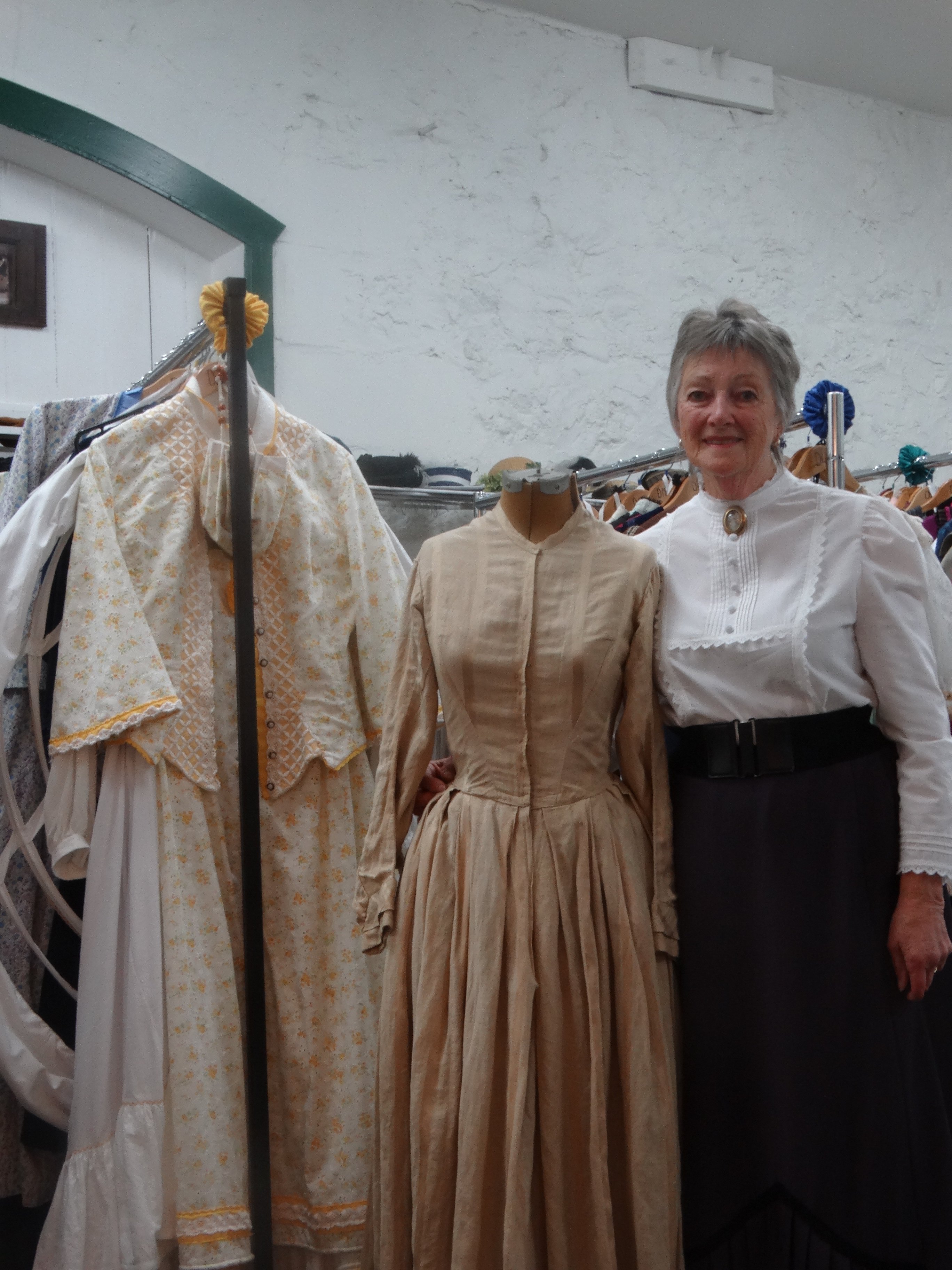 The Victorian Wardrobe volunteer Dawn Sutherland with the Victorian-era dress she found when she...